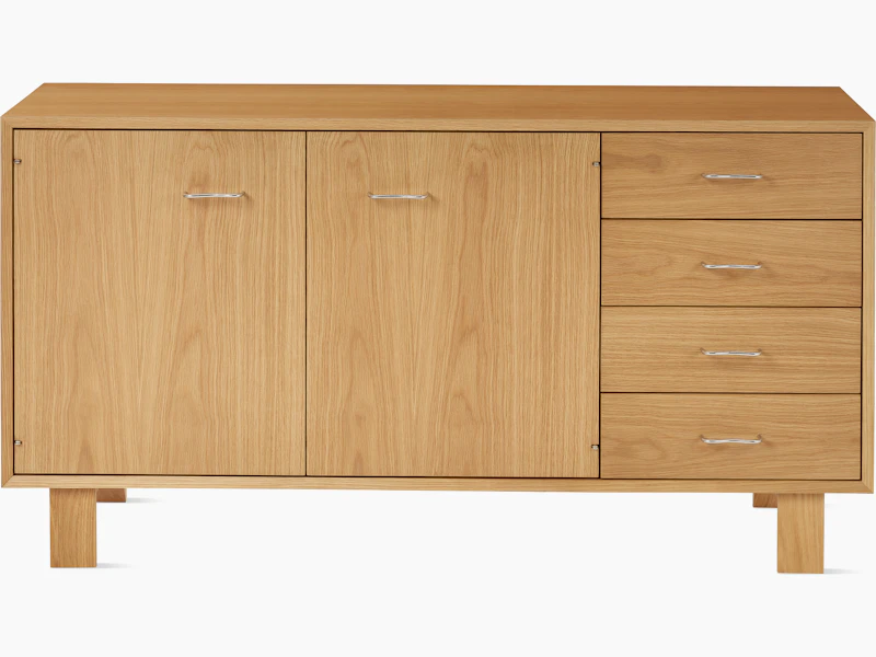 Nelson Basic Cabinet Series Credenza in natural oak with two doors, four drawers, standard square legs, and wavy pulls.