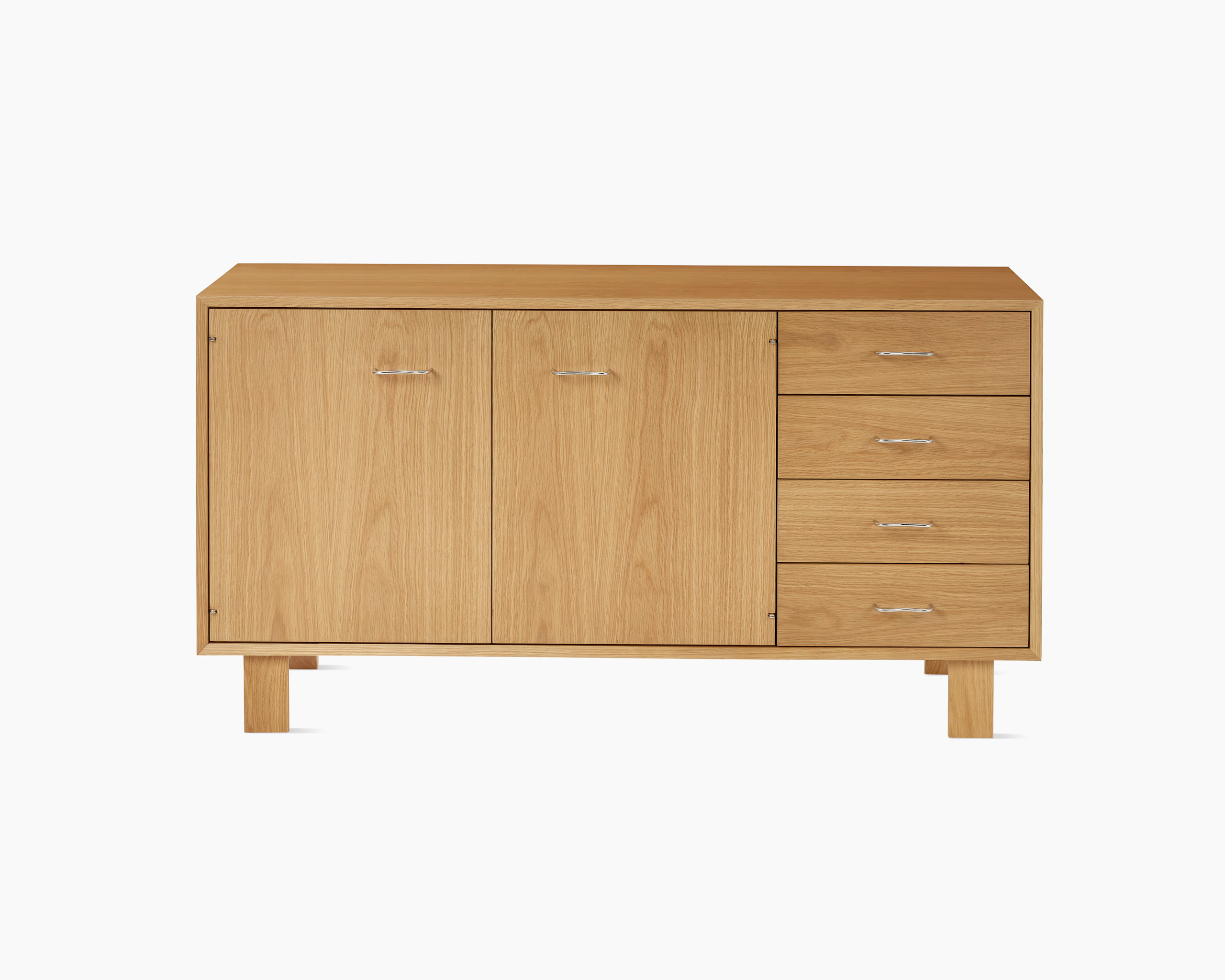 Nelson Basic Cabinet Series Credenza in natural oak with two doors, four drawers, standard square legs, and wavy pulls.