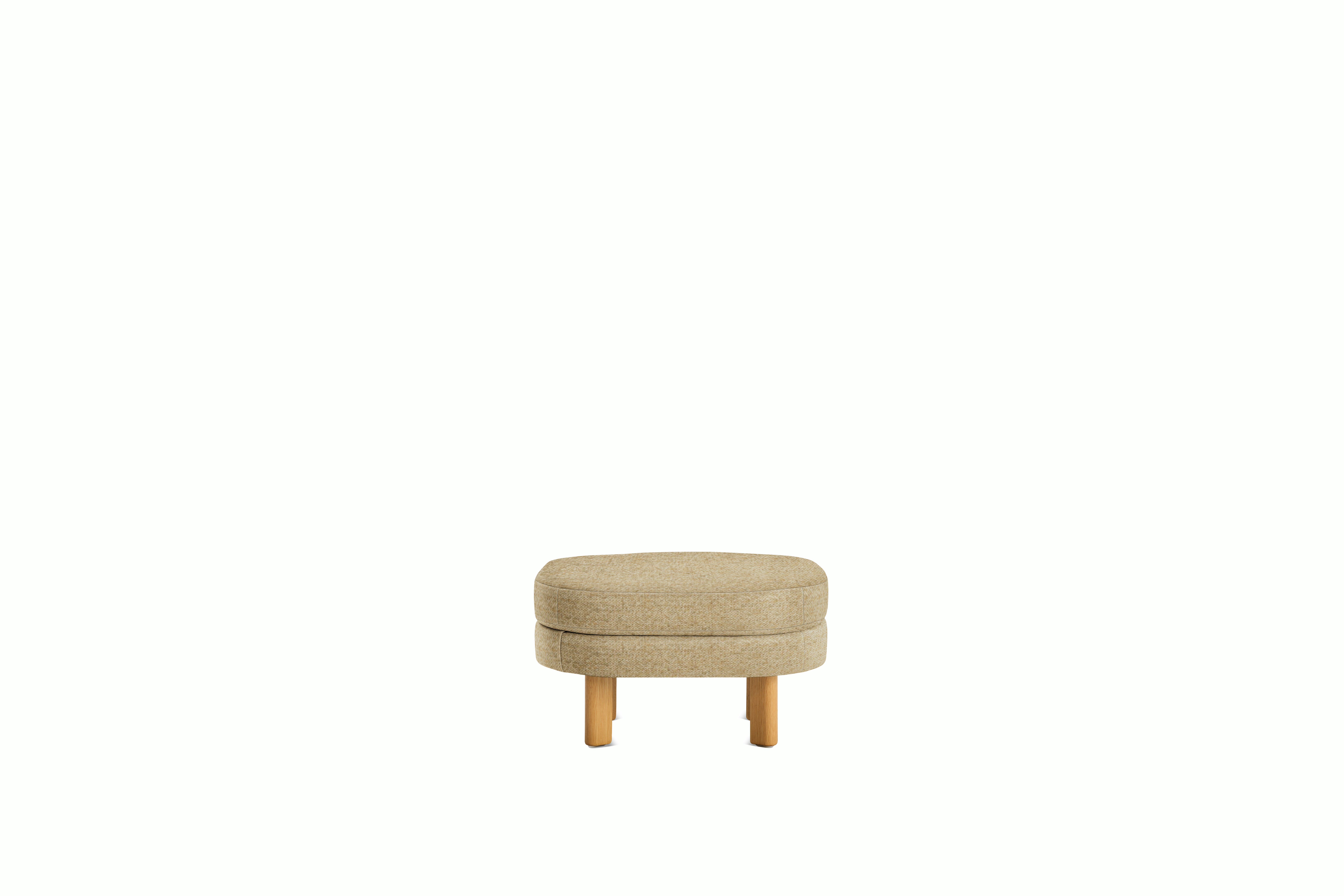 A Emmy Ottoman in bisque viewed from the front.