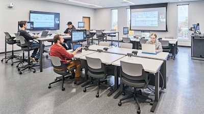 Students working in a classroom at the Ferris State University Center for Virtual Learning