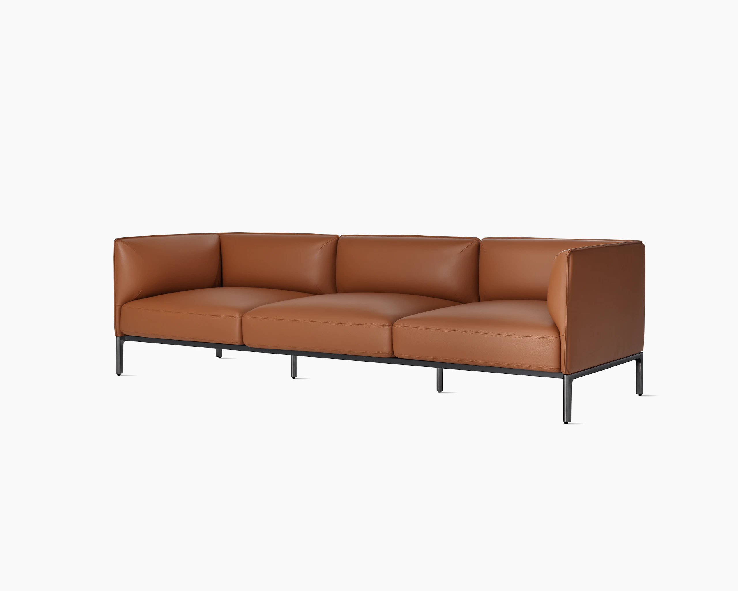 Angle view brown leather Mimo 3 seat sofa on white background.