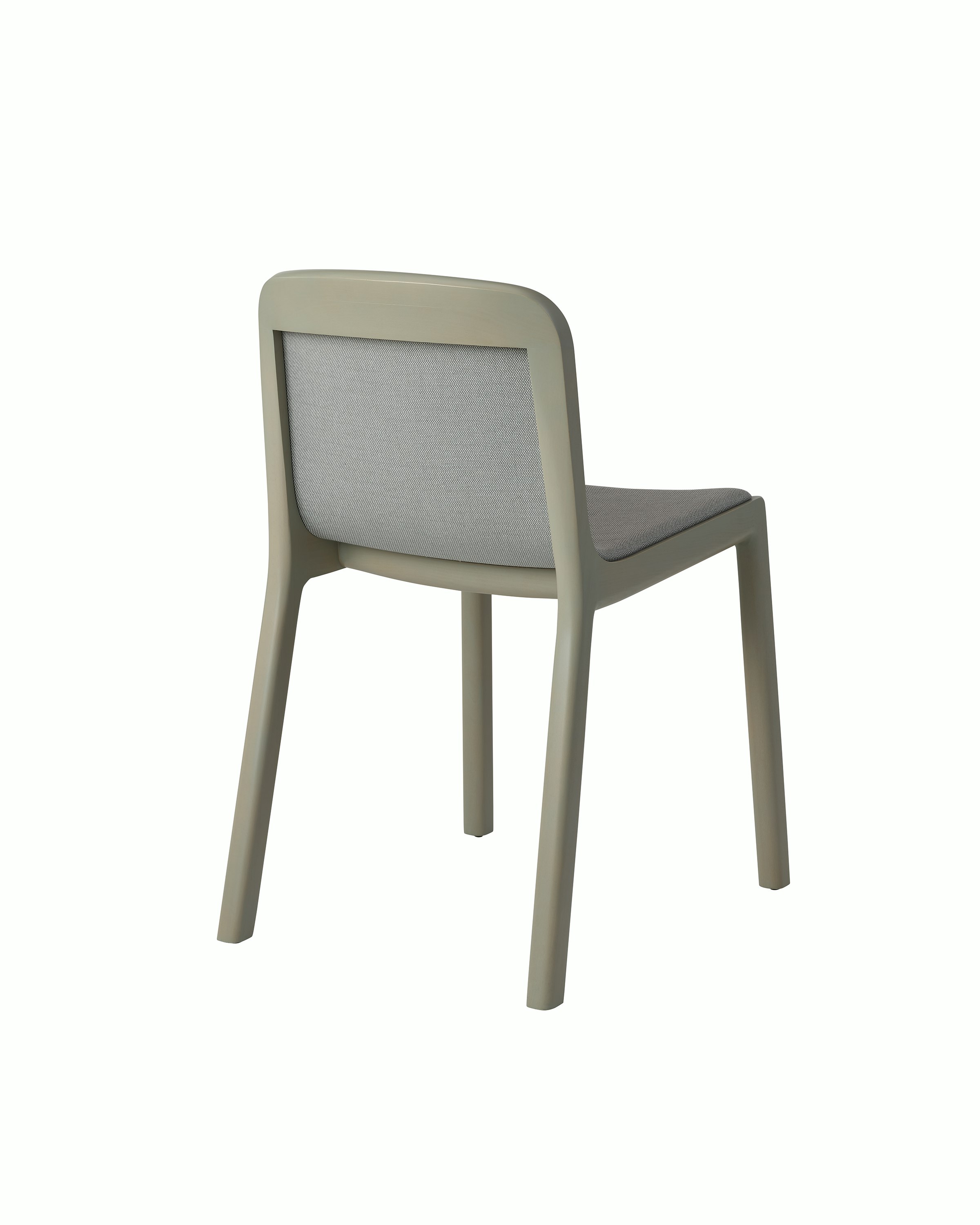 Lijn Side Chair by Carole Baijings for Geiger in Pumice frame upholstered with Maharam Rowan in Daydream, angled back view on a white sweep.