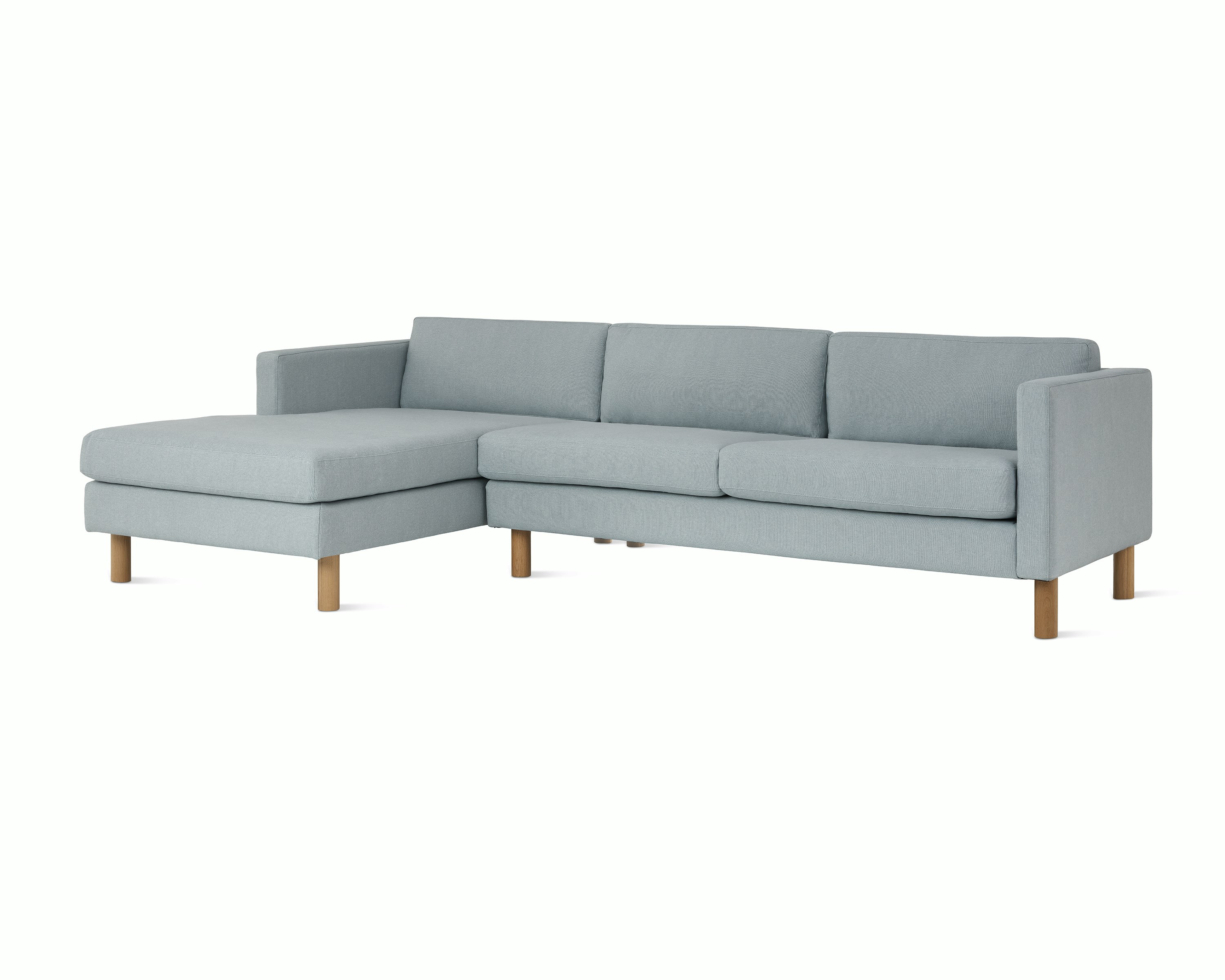 Lispenard Sofa with left chaise in light blue fabric upholstery, viewed from an angle.