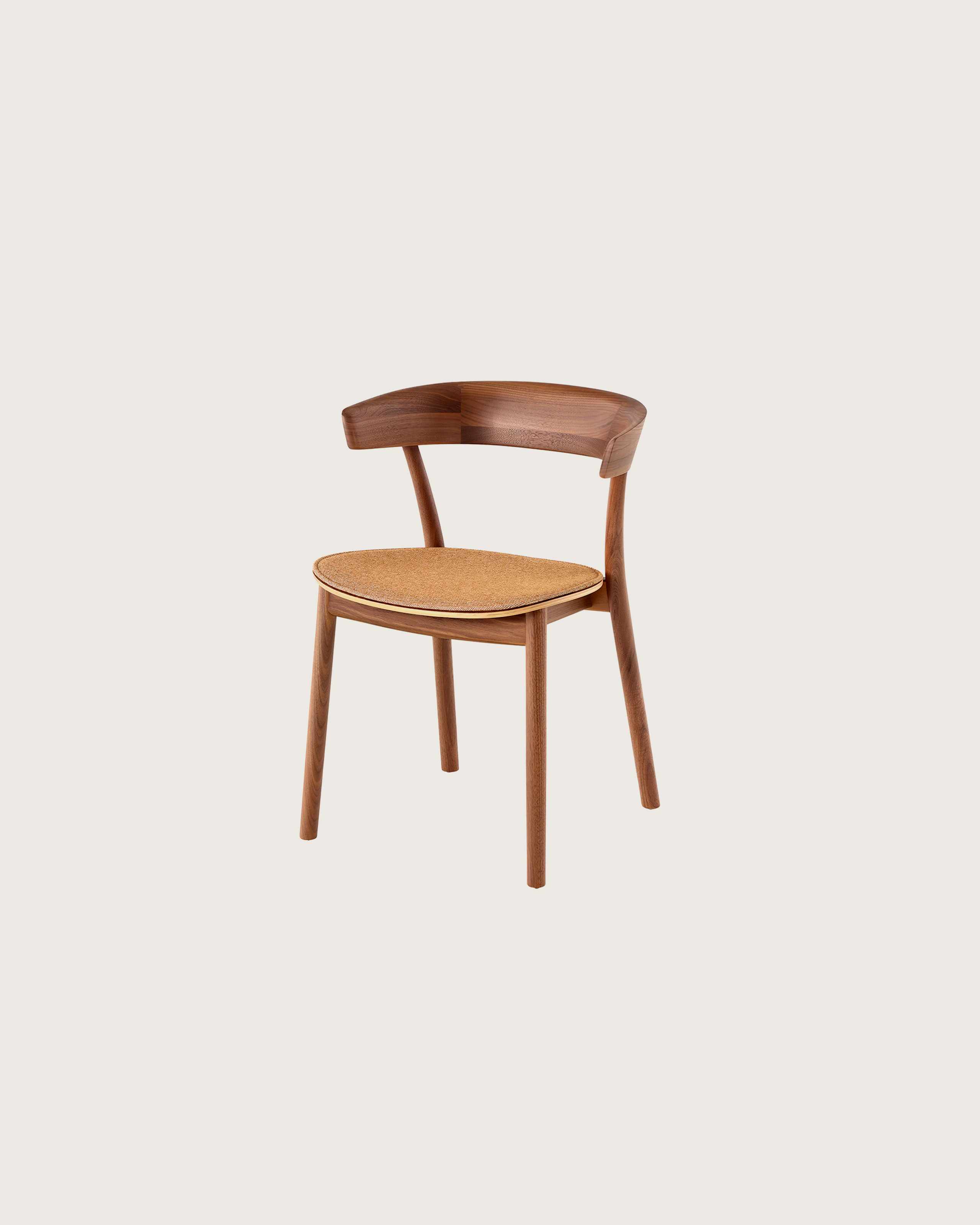 A Leeway Chair with a Walnut frame, featuring a copper colored upholstered seat, viewed from a three-quarter perspective.