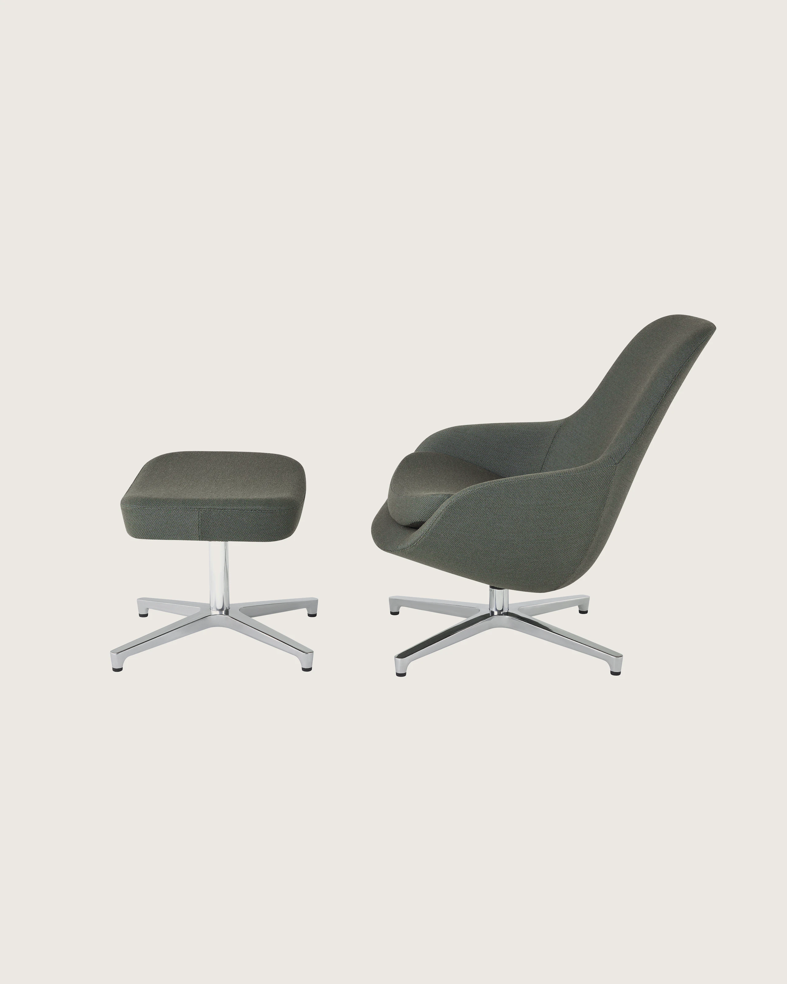 Profile view of a Saiba Lounge Chair and Ottoman.