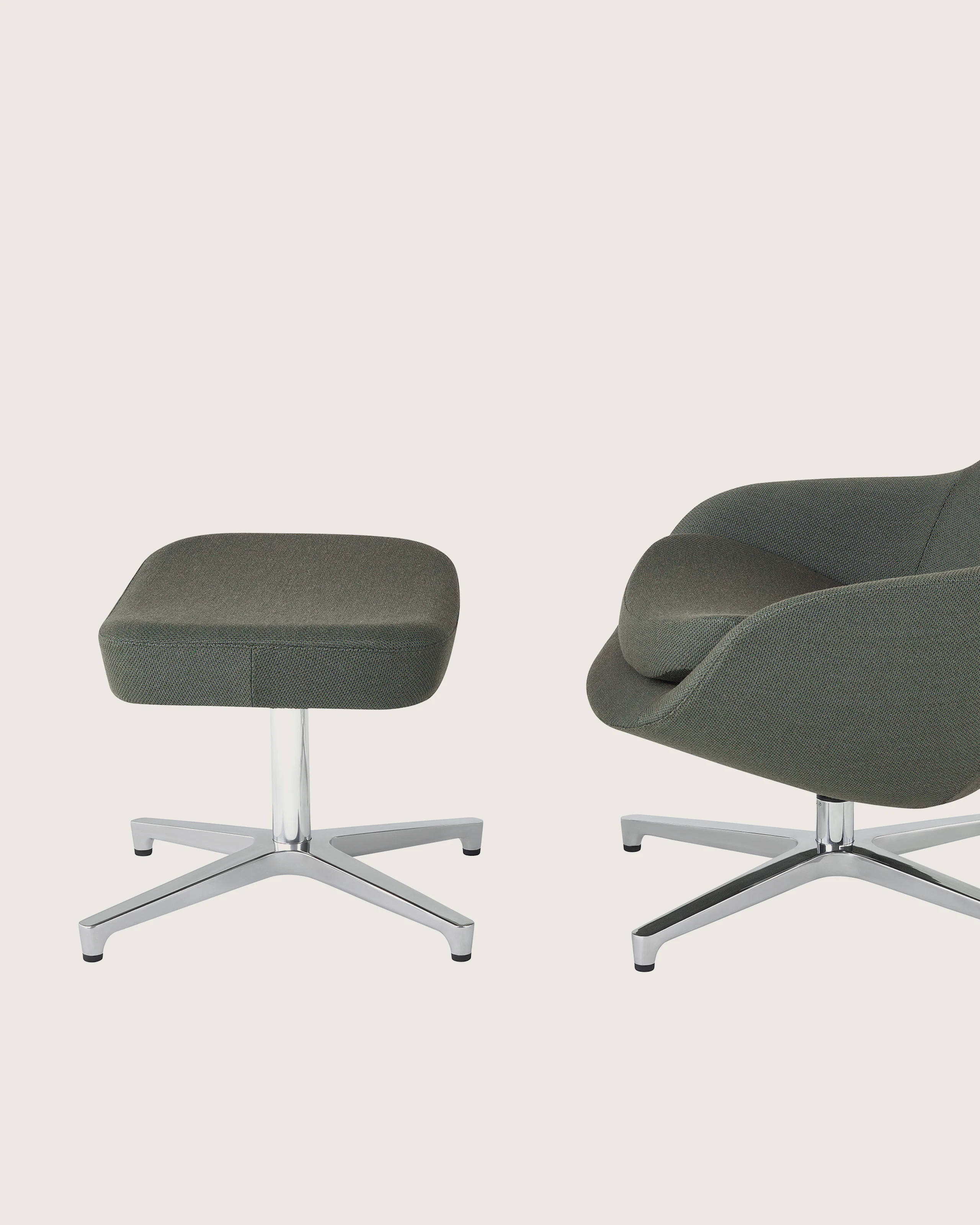 Profile view of a Saiba Lounge Chair and Ottoman.