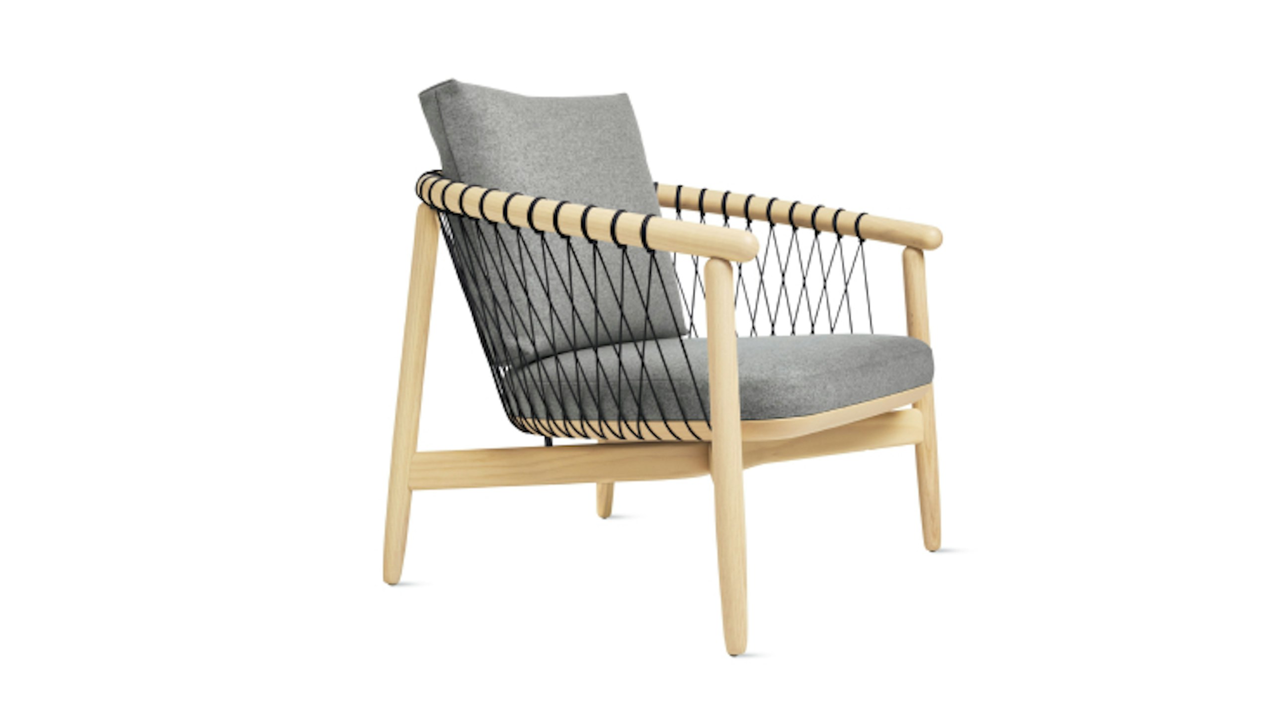 A side view of a Crosshatch Chair by Geiger with a natural wood frame and grey seat back and cushion