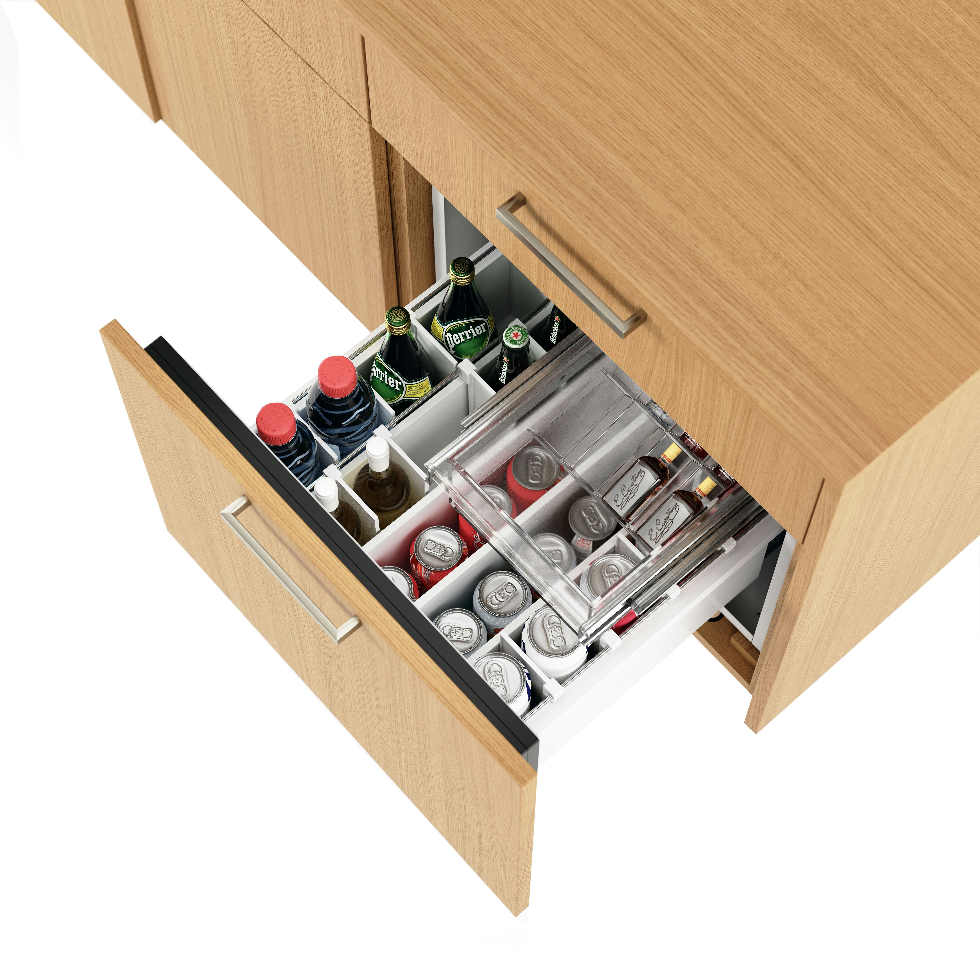 Detail shot of a fridge drawer in a JD Credenza in Natural Rift Cut Oak with Satin Nickel drawer pulls.