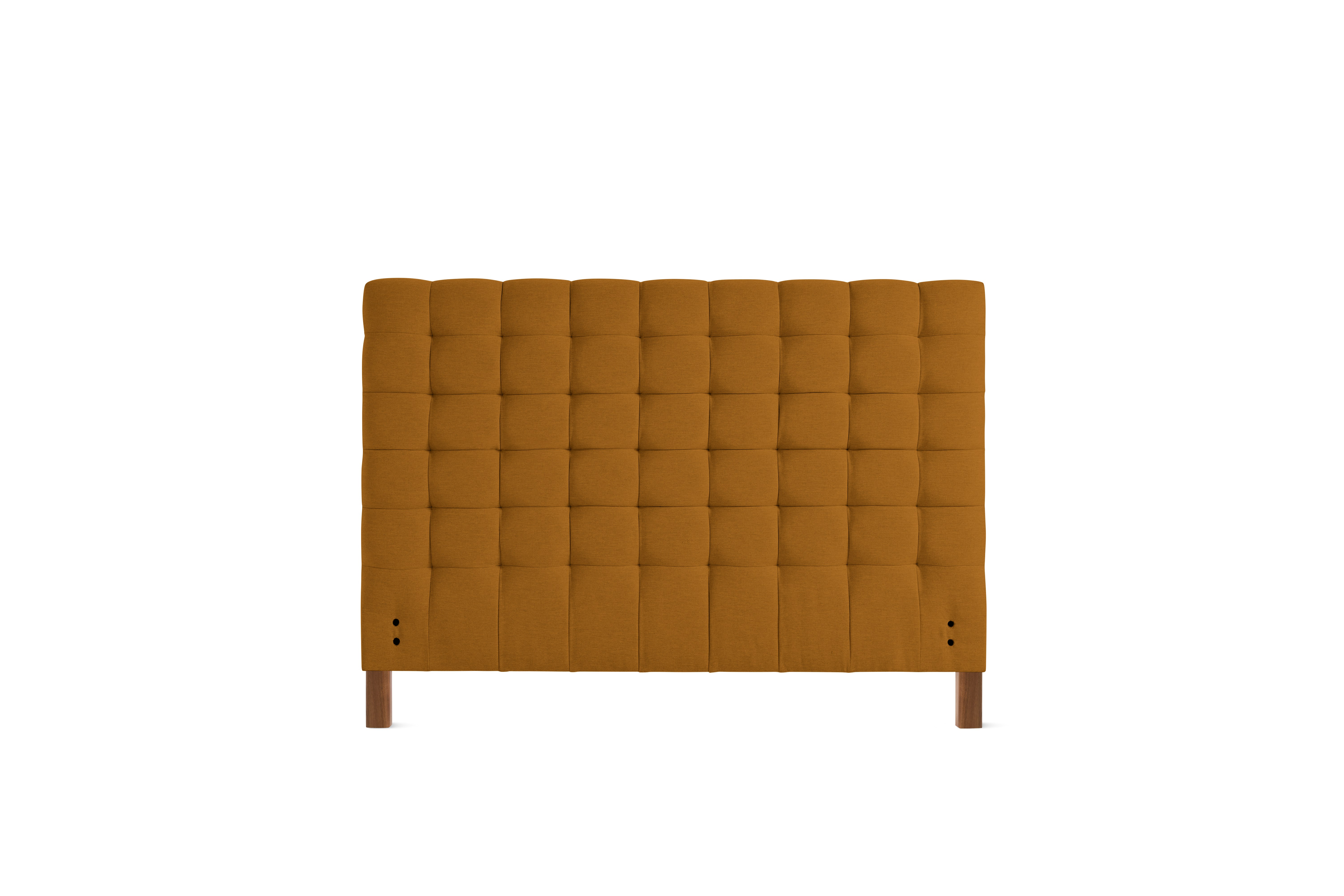 A Madeleine Headboard in Mode, Nutmeg, Walnut viewed from the front.