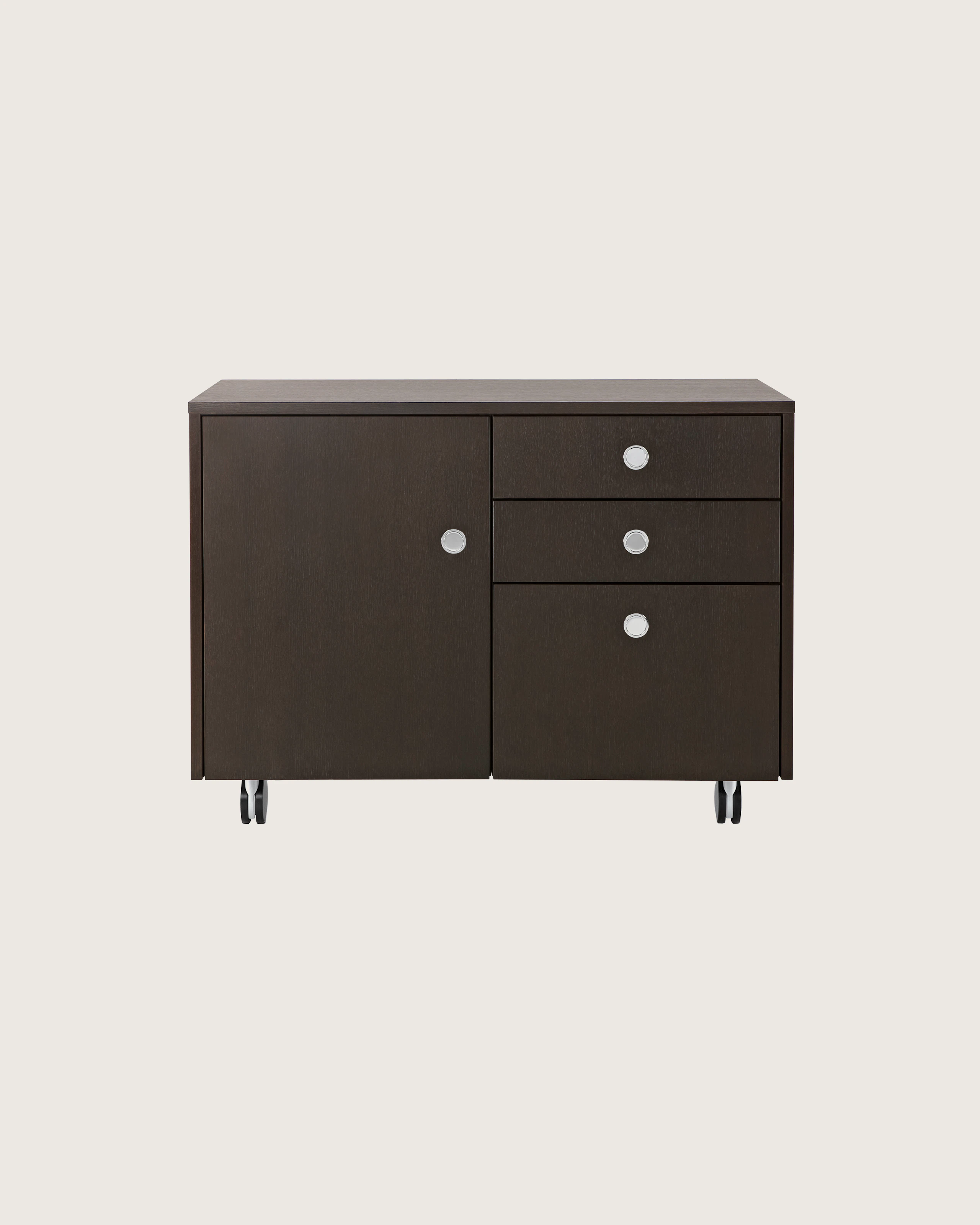 Sled Base Storage unit with a dark wood finish, showing four flush-mounted Flip pulls.