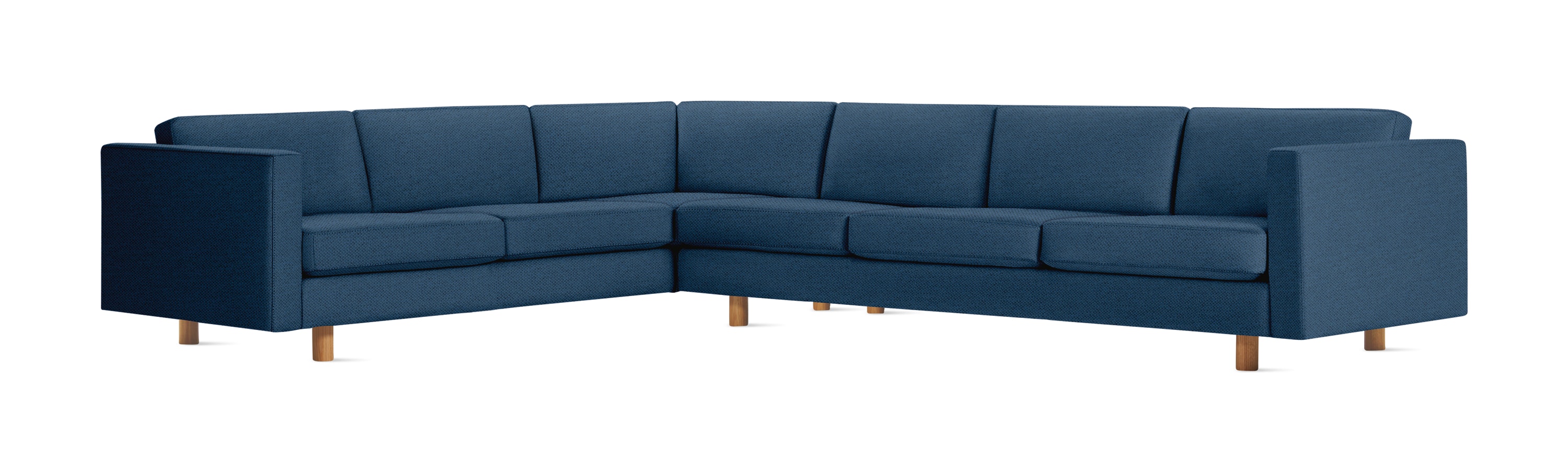 Lispenard Sectional in denim blue color with 4" legs.