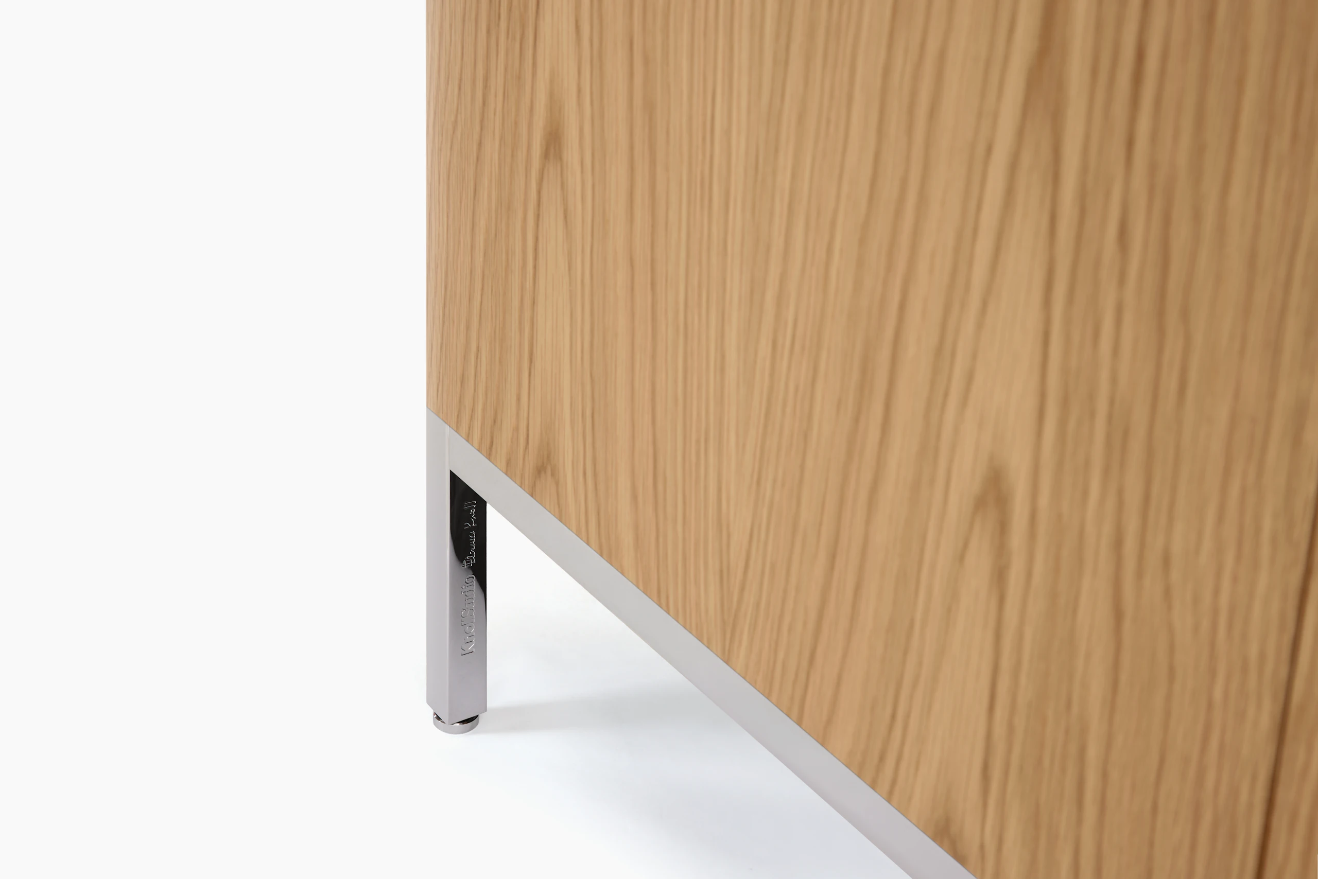 Detail image of a light brown wood Florence Knoll Credenza.