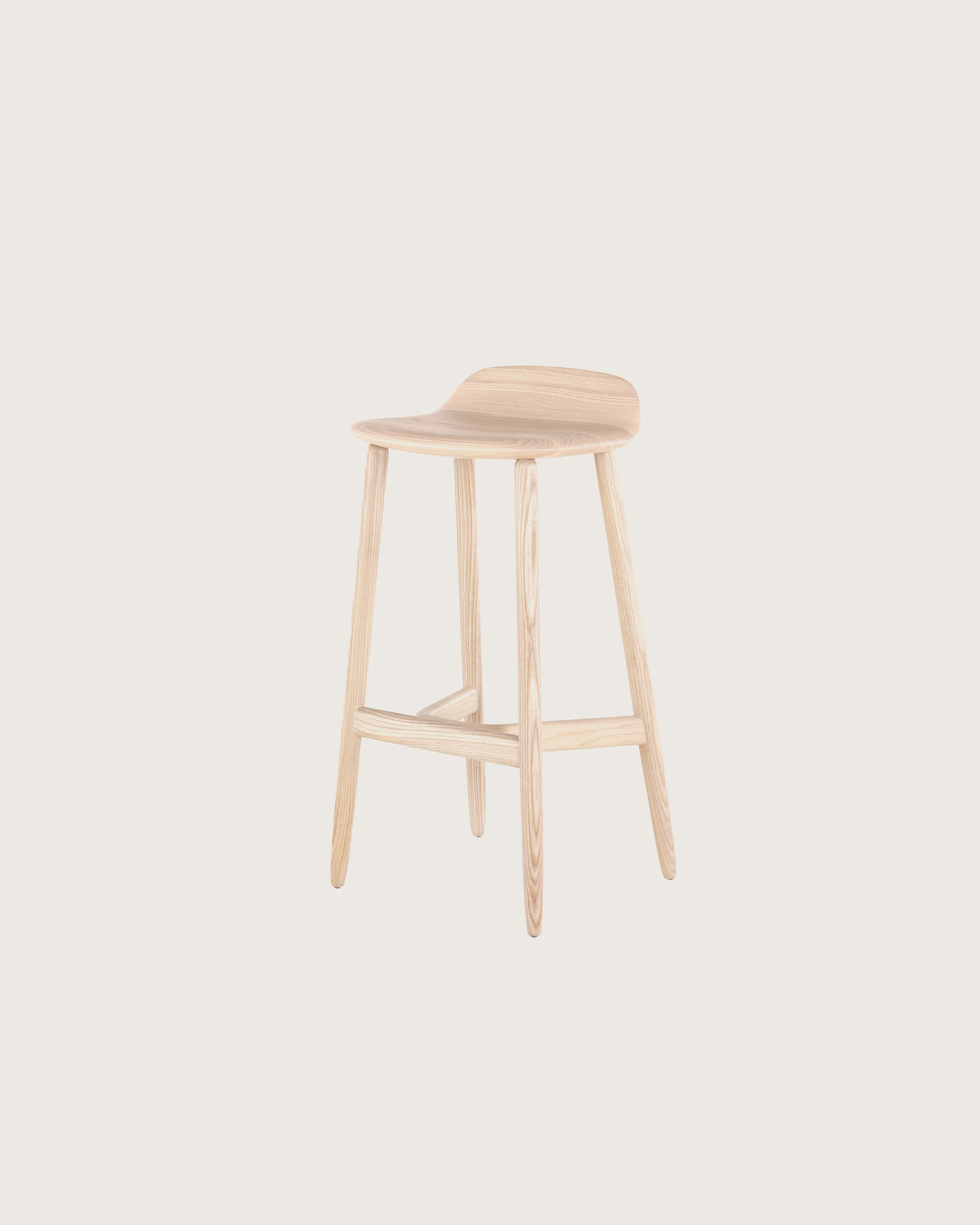 Angled view of a bar-height wood Crosshatch Stool with a light finish.