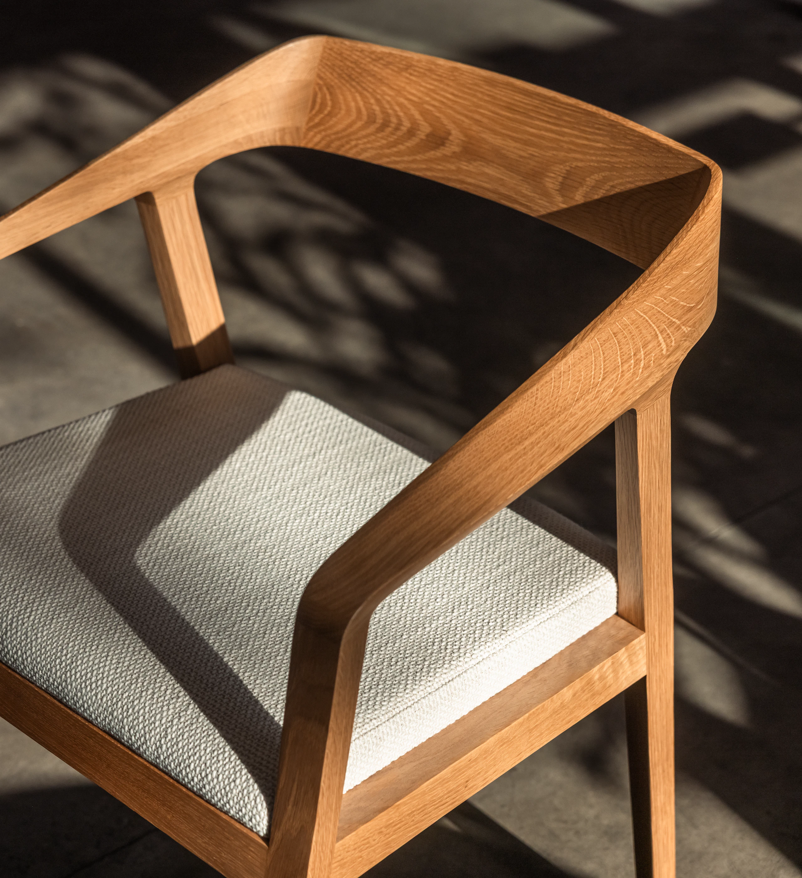 Full Twist Armchair with grey upholstered seat