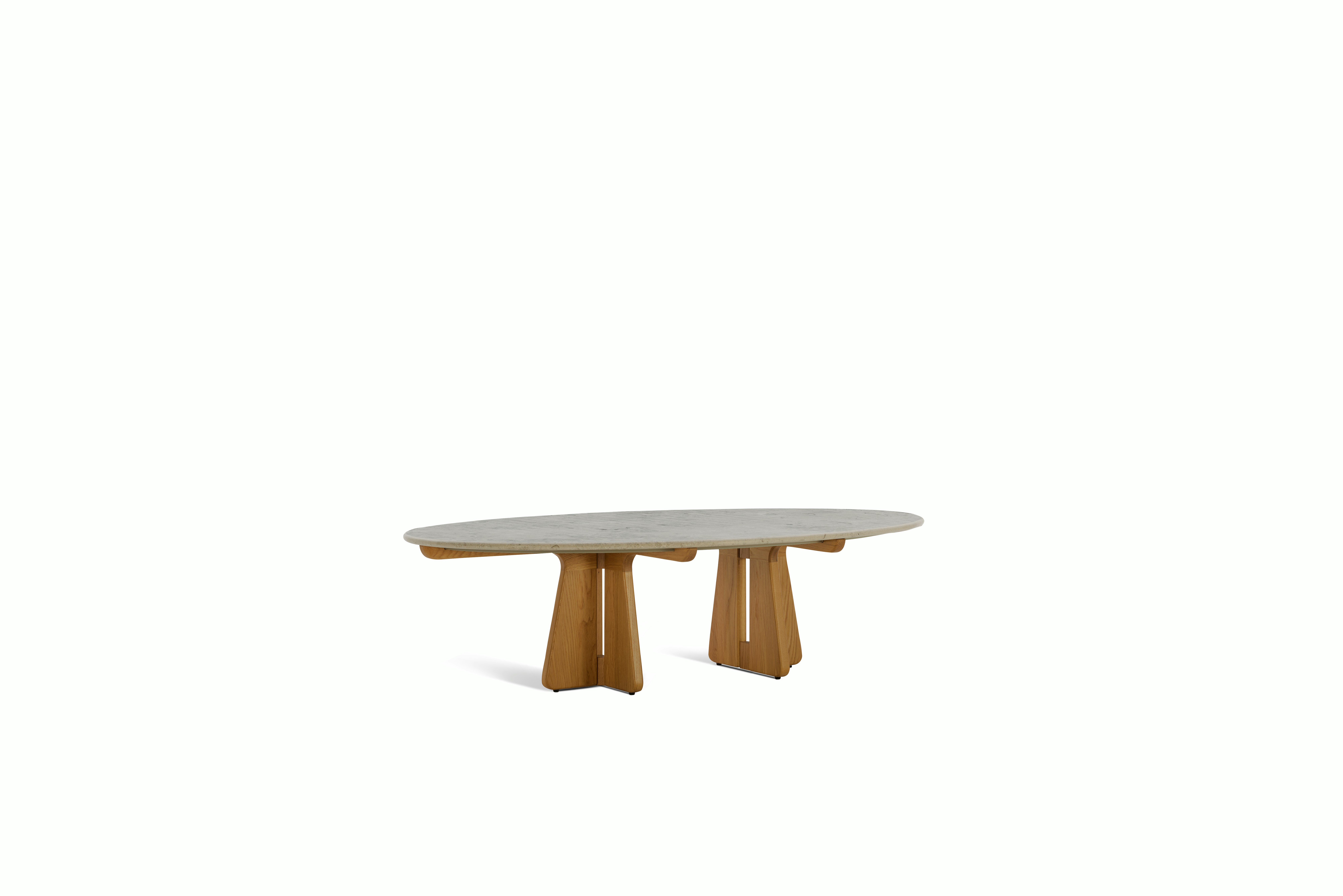 A Pinna Coffee Table in Jura Blau Oak viewed from an angle.