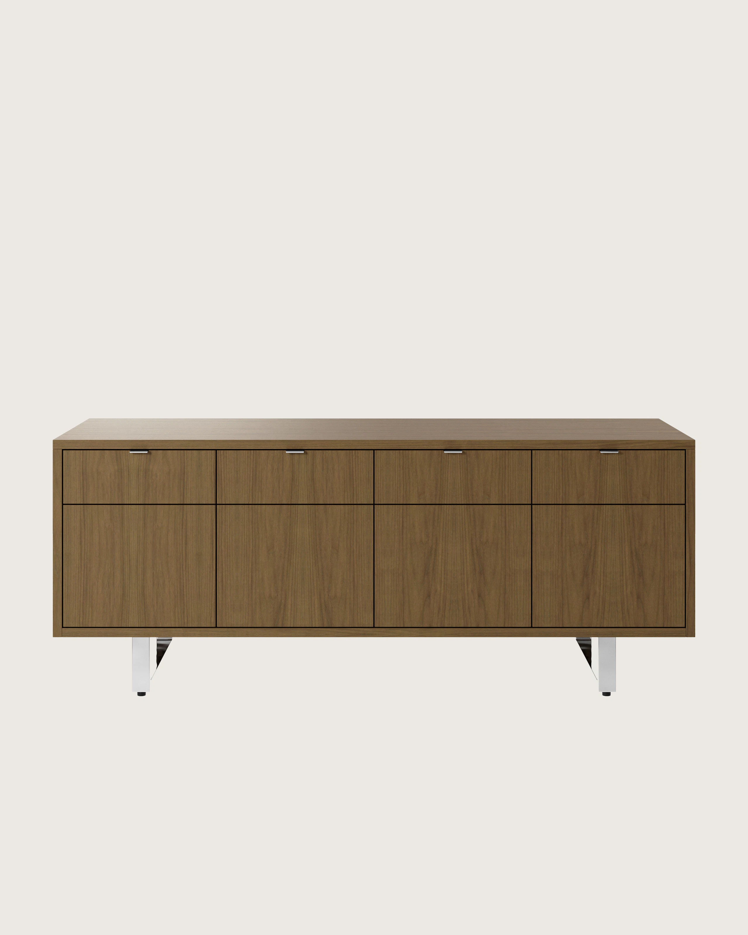 Highline Twenty Five Credenza in Natural Flat Cut Walnut with Polished Chrome base and drawer pulls viewed from the front.
