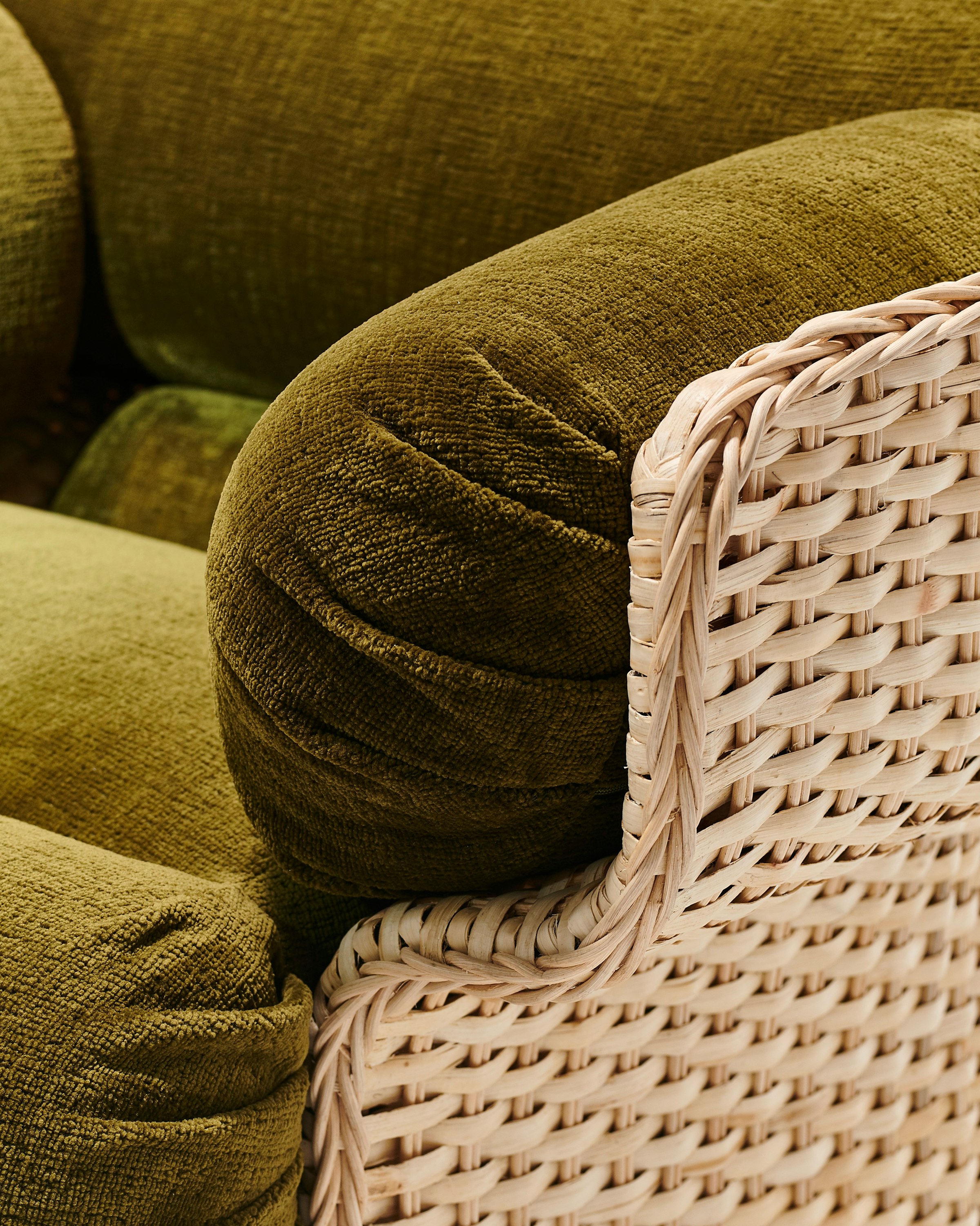 A detailed look at Basket Lounge Chair in Moss, Rattan.