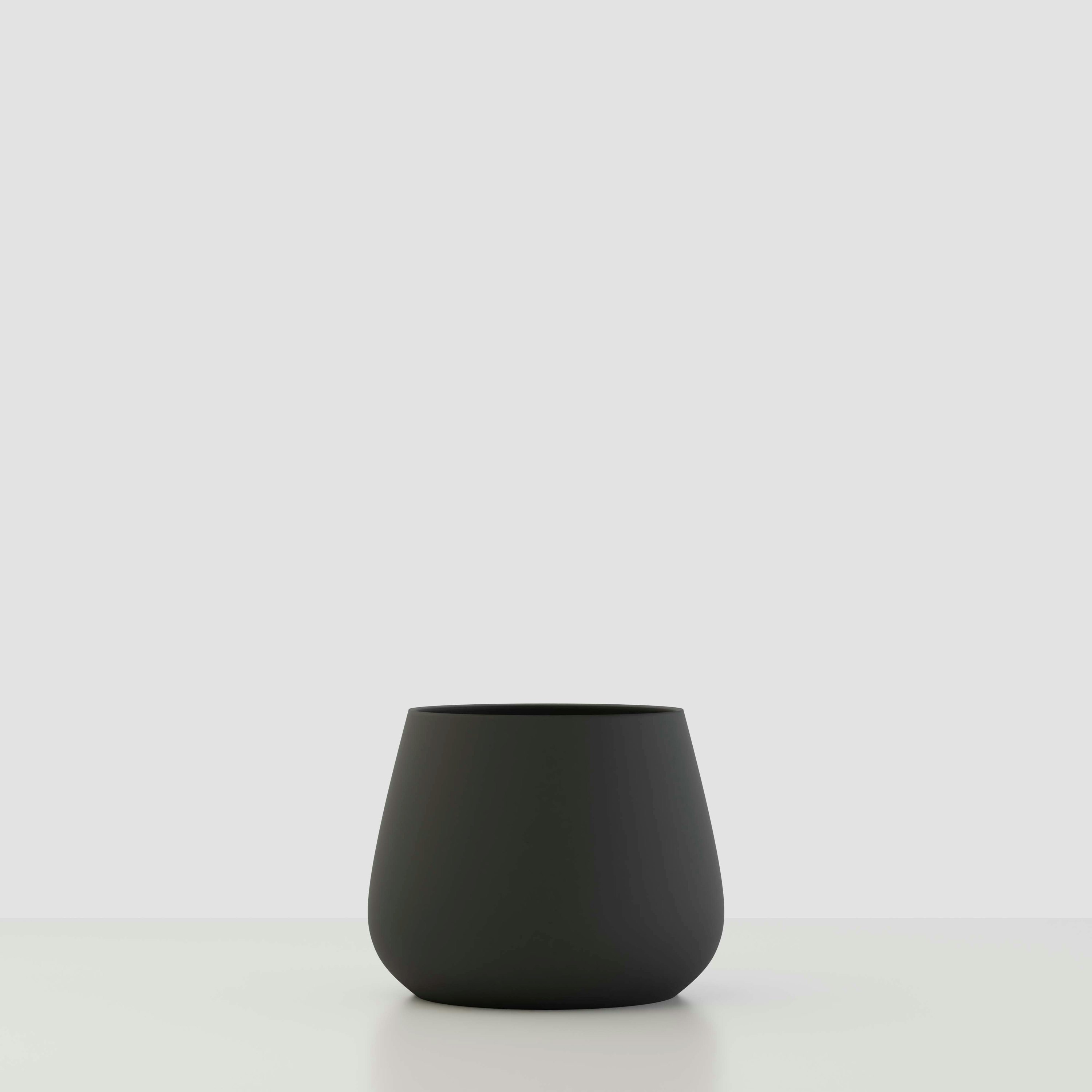 A Sausalito Concrete Planter in Obsidian Night Viewed from the front.