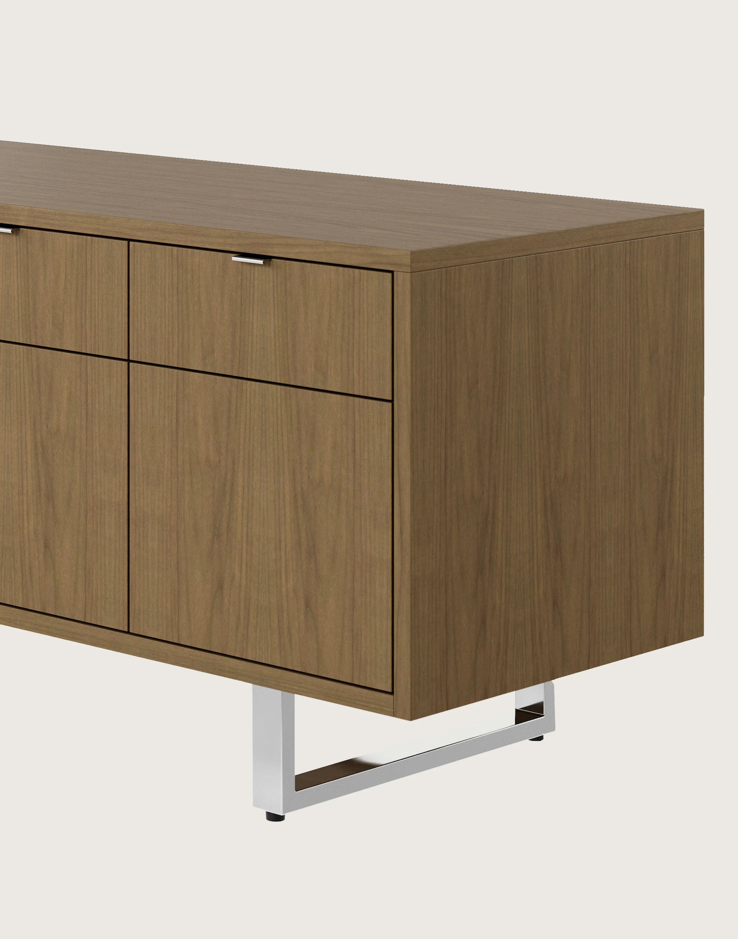 Highline Twenty Five Credenza in Natural Flat Cut Walnut with Polished Chrome base and drawer pulls viewed from a 45 degree angle.