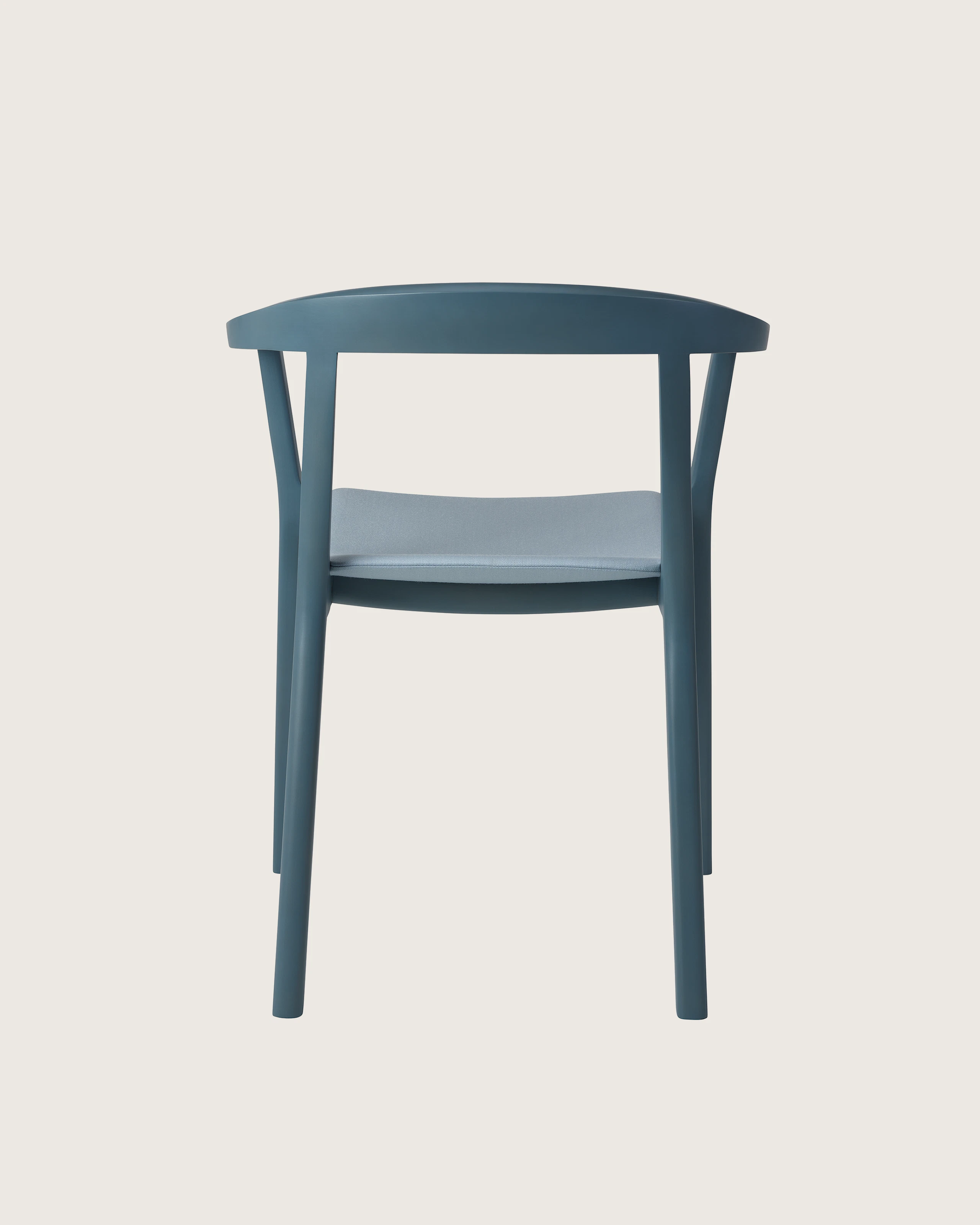Lijn Armchair by Carole Baijings for Geiger in Nordic Blue frame upholstered with Maharam Valor in Alfresco, back view on a white sweep.