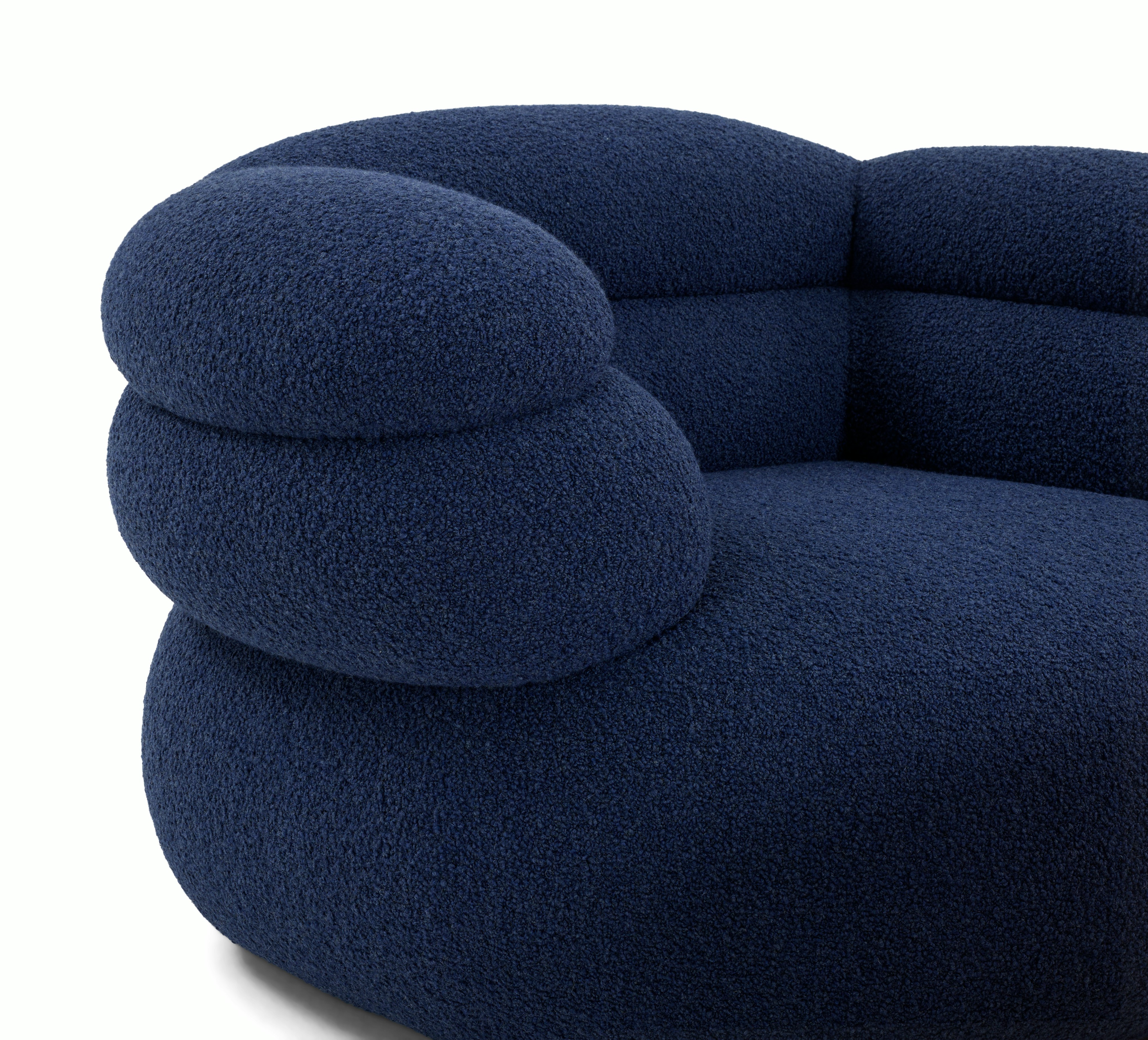 A detailed look at a Biboni Lounge Chair in Solid Sublime Navy.