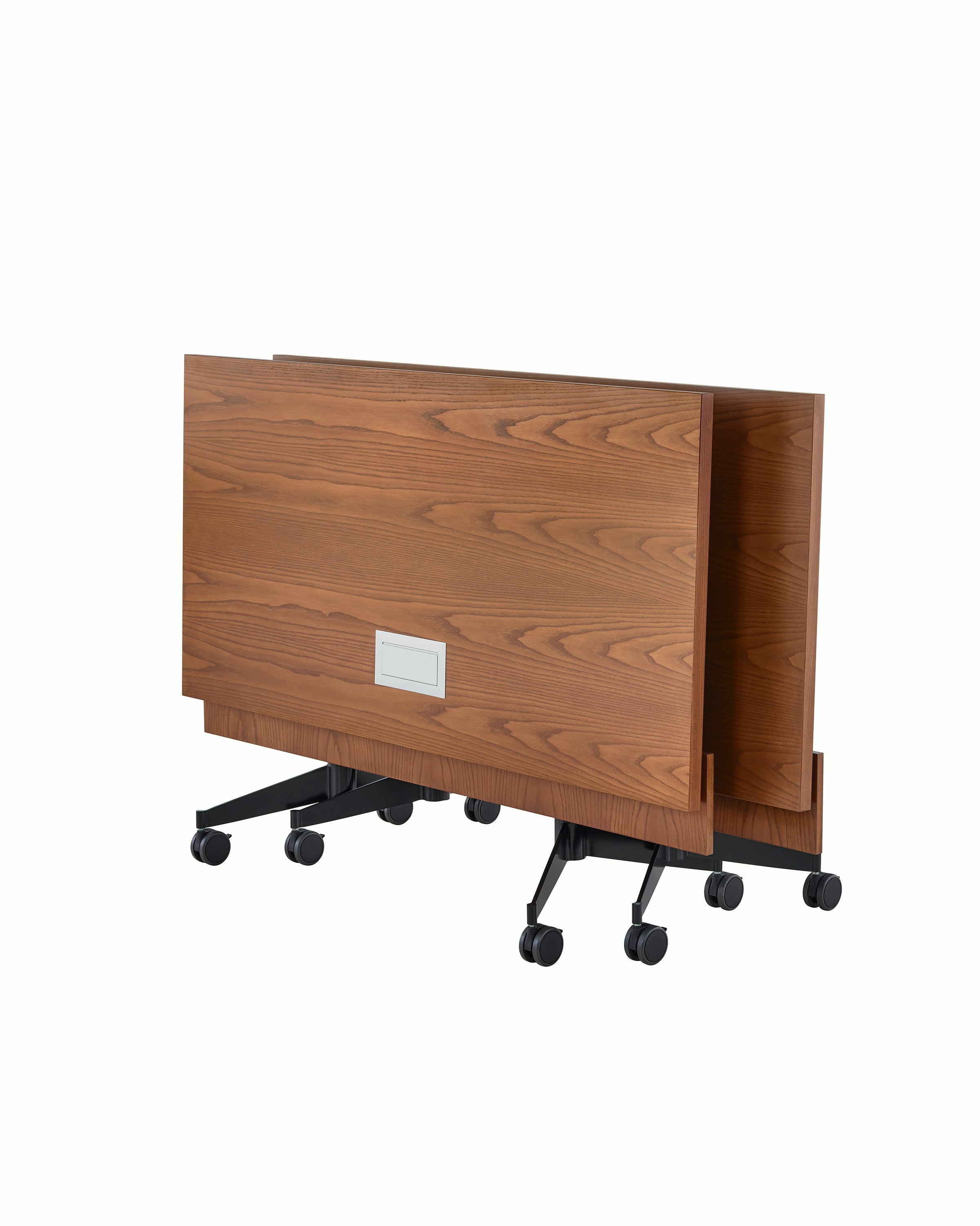 Two rectangular MP Flex Tables, folded upright and nested together.
