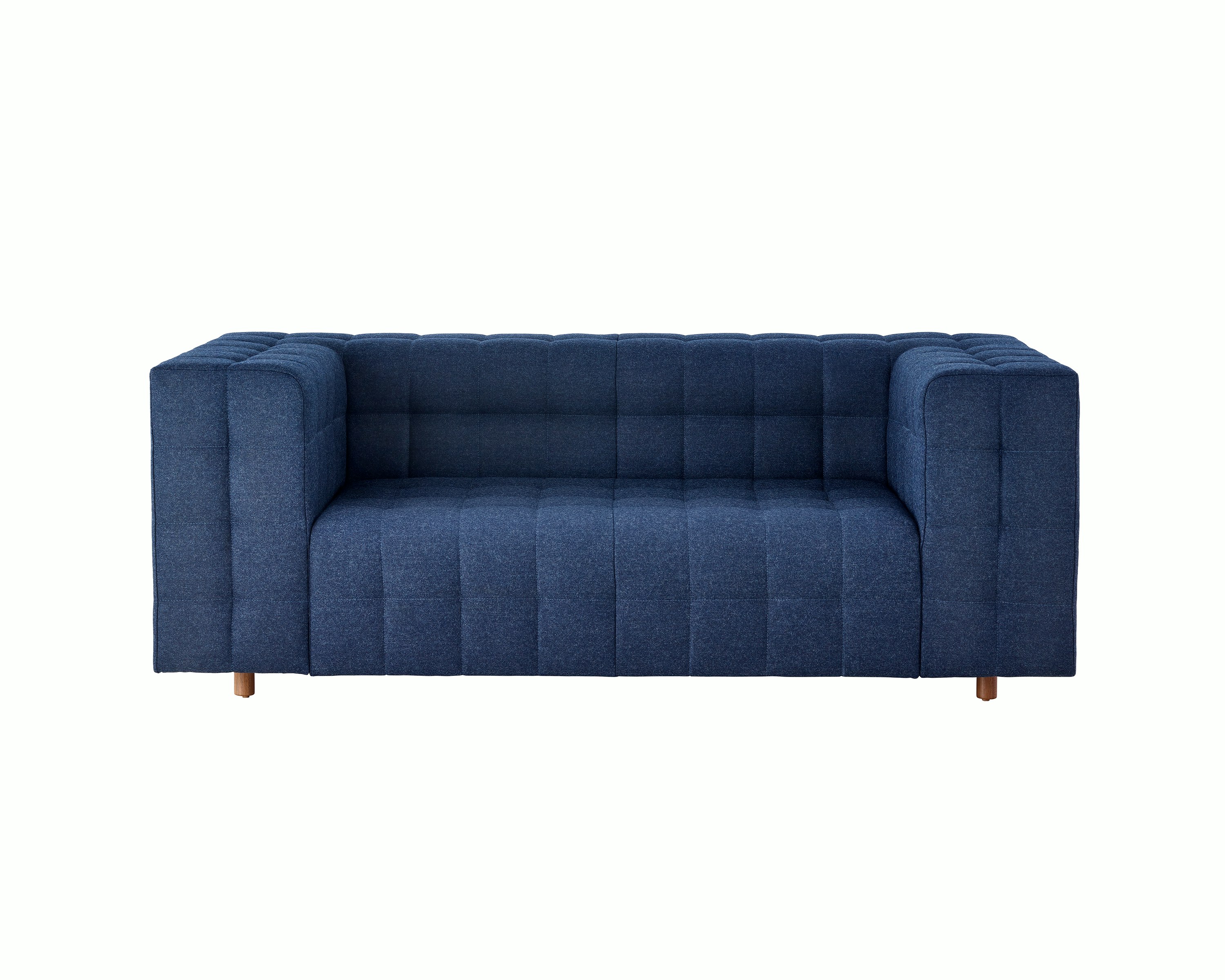 A two-seat Rapport Sofa in a deep navy colored textile, viewed at an angle.