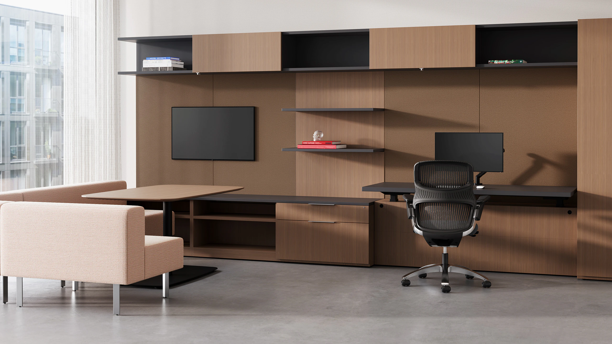 Reff Profiles multi-use private office with soft seating to support video conferencing.