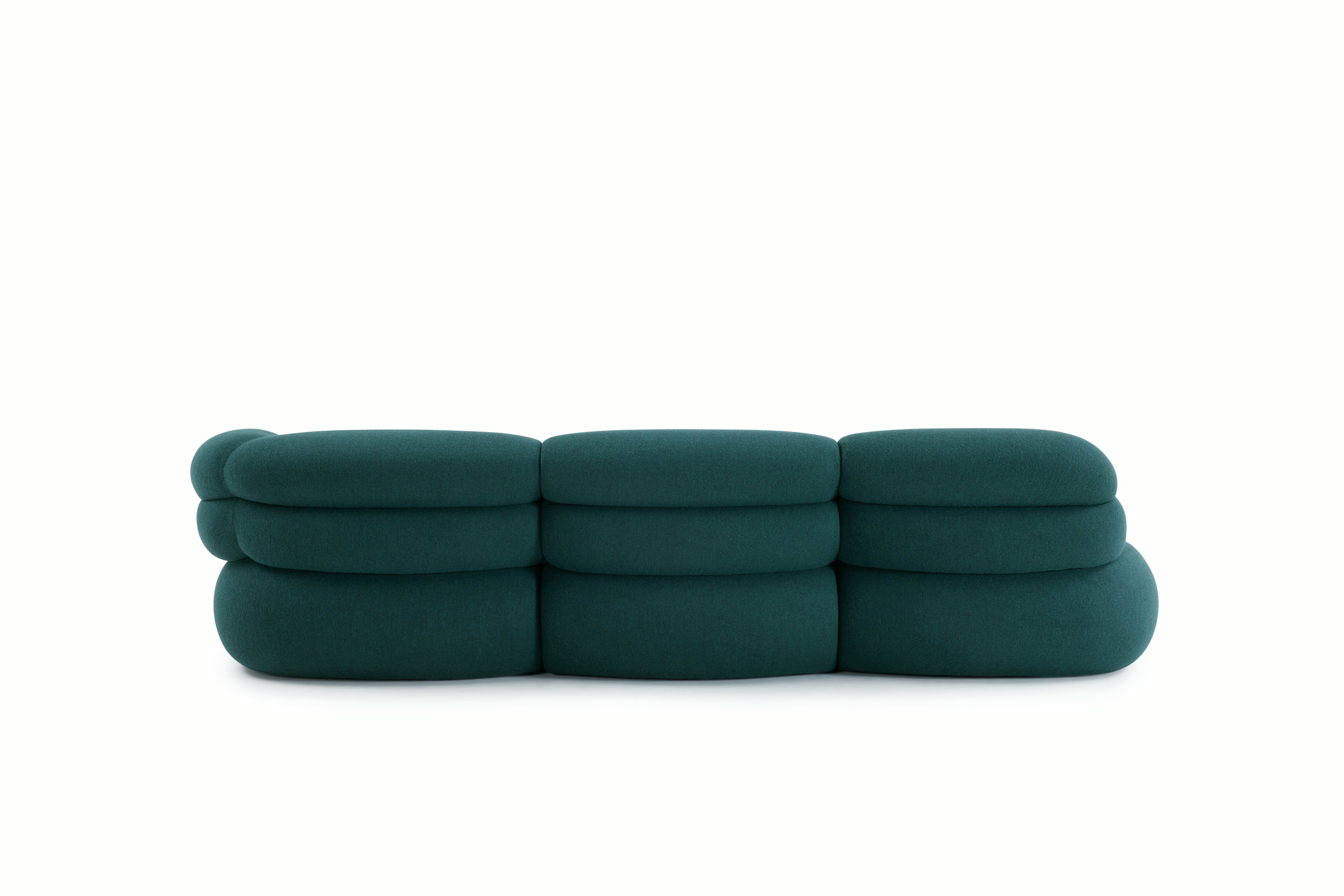 A Biboni Open End Sofa in Stellium, Midnight Teal viewed from behind.