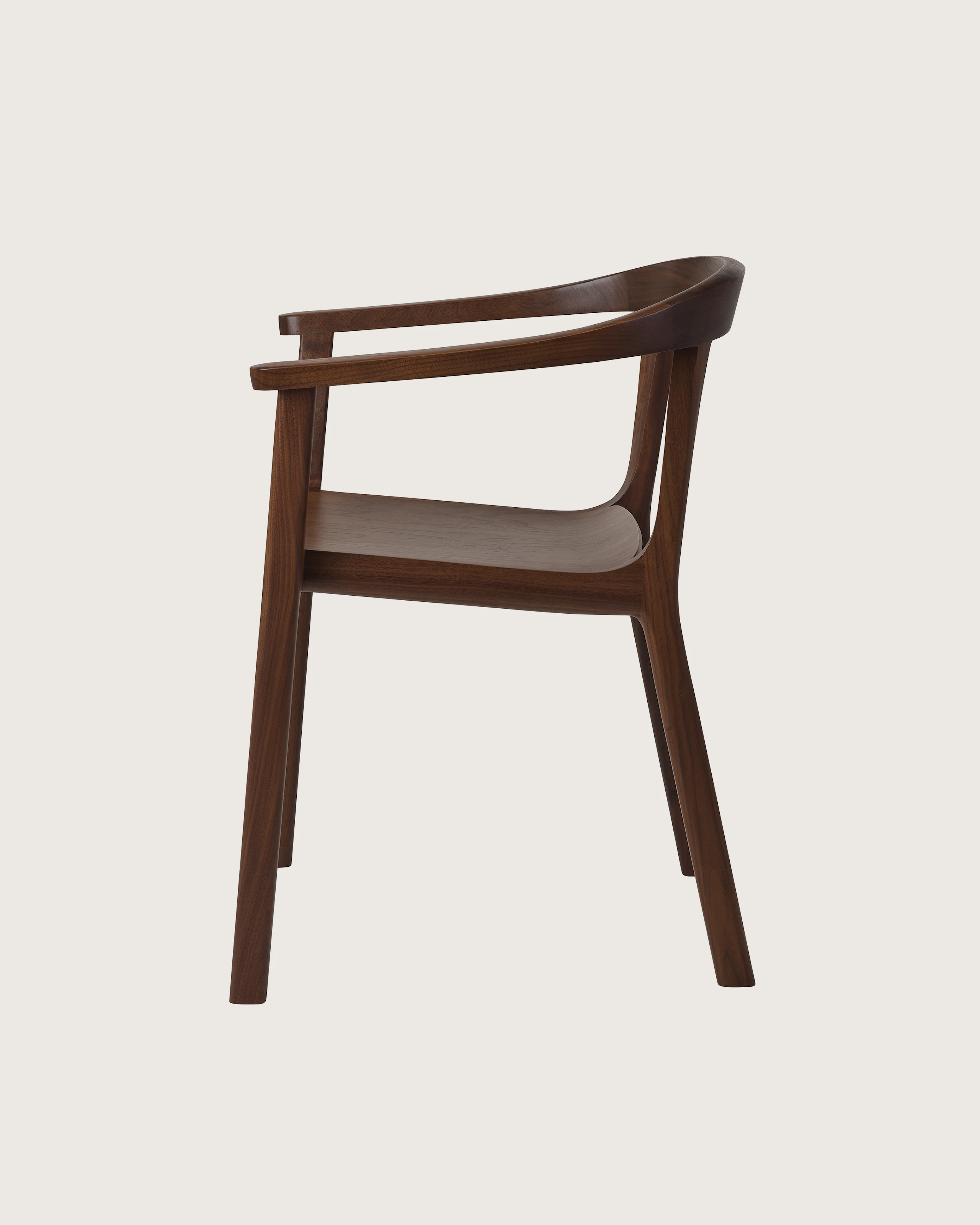 Lijn Armchair by Carole Baijings for Geiger in Persian Walnut frame, side view on a white sweep.