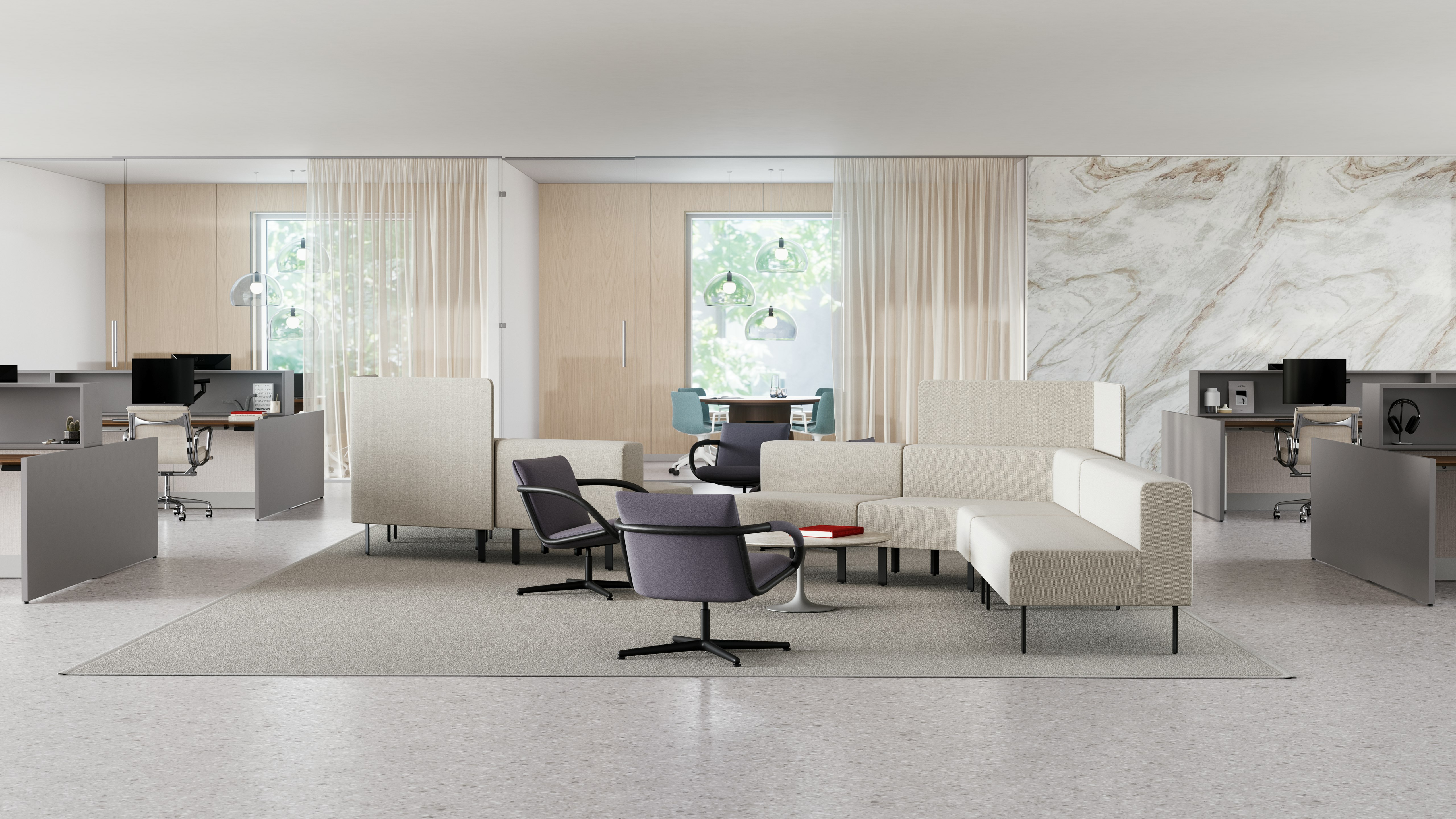 A light color open office is shown with workstations, casual meeting spaces and private offices.