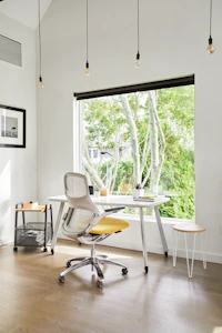 Generation by Knoll; Rockwell Unscripted Easy Table; Rockwell Unscripted Mobile Storage Cart; Sparrow Desktop Light; Florence Knoll Hairpin Table