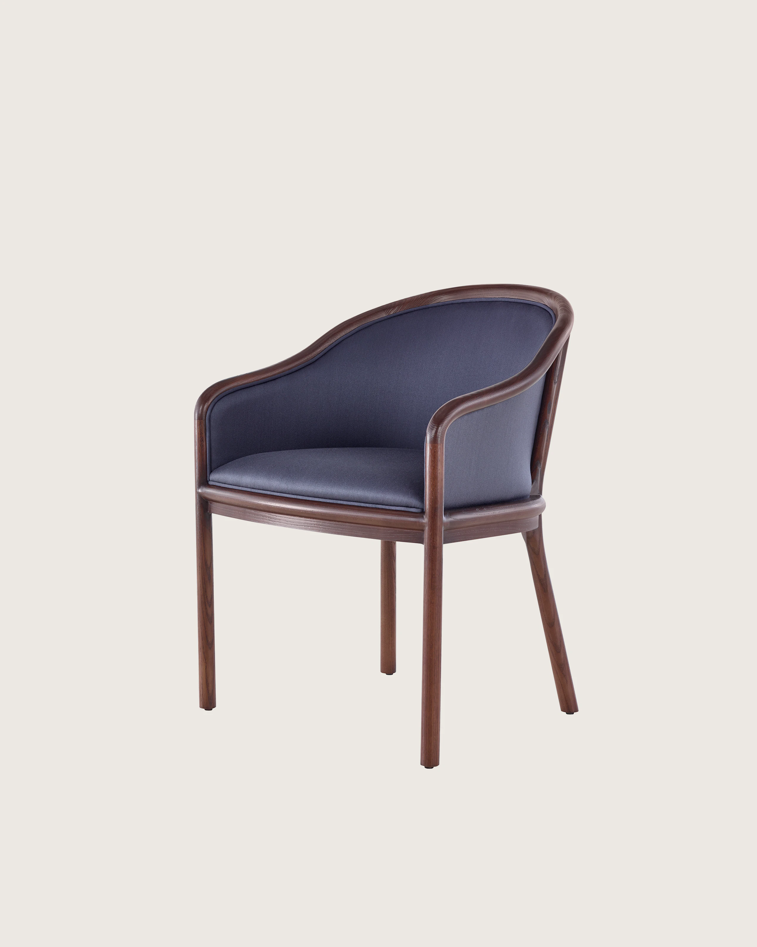 Partial angled view of the seat and back of a Landmark side chair, showing dark blue French upholstery.