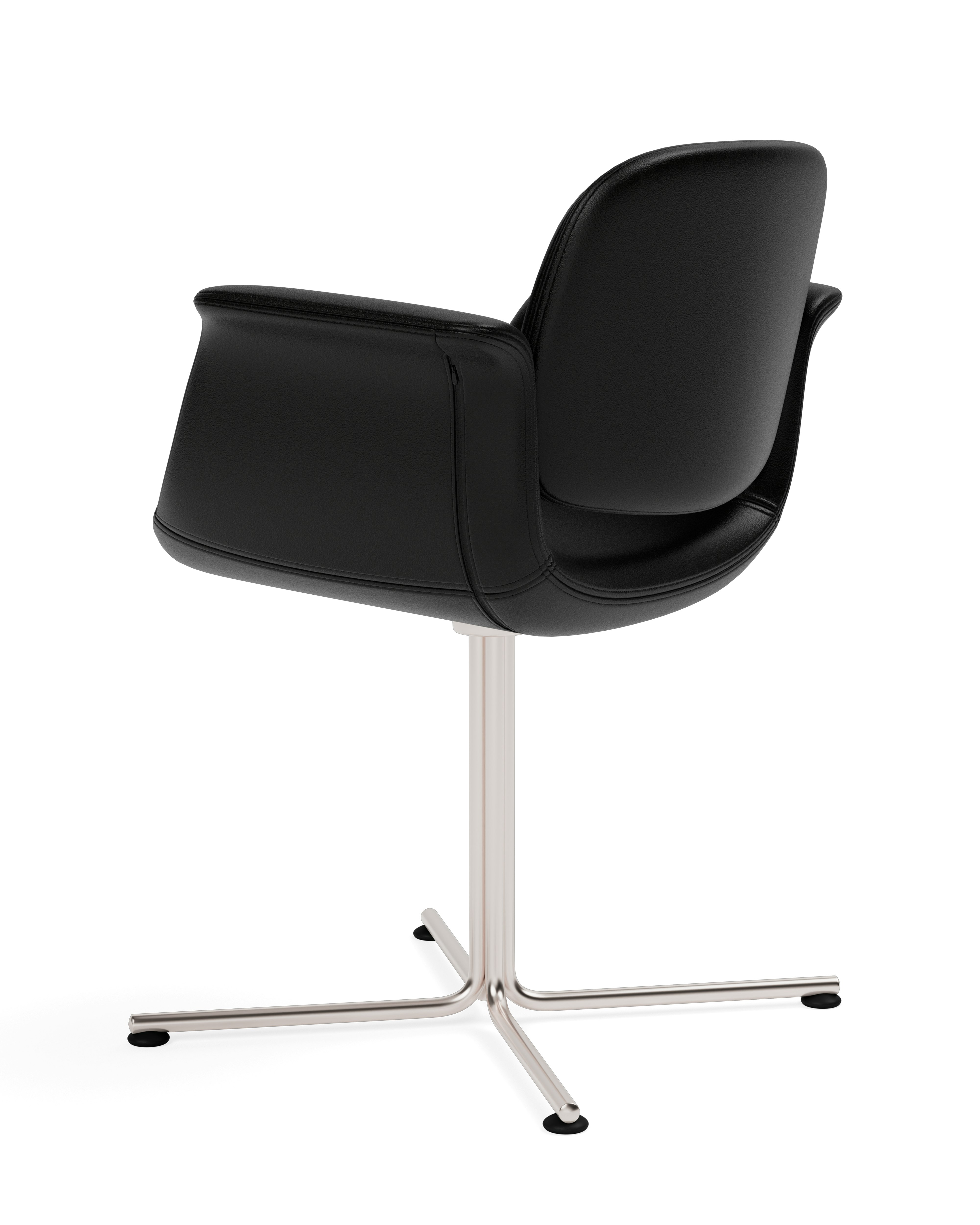 A Flamingo Chair in 301Black viewed from the side.