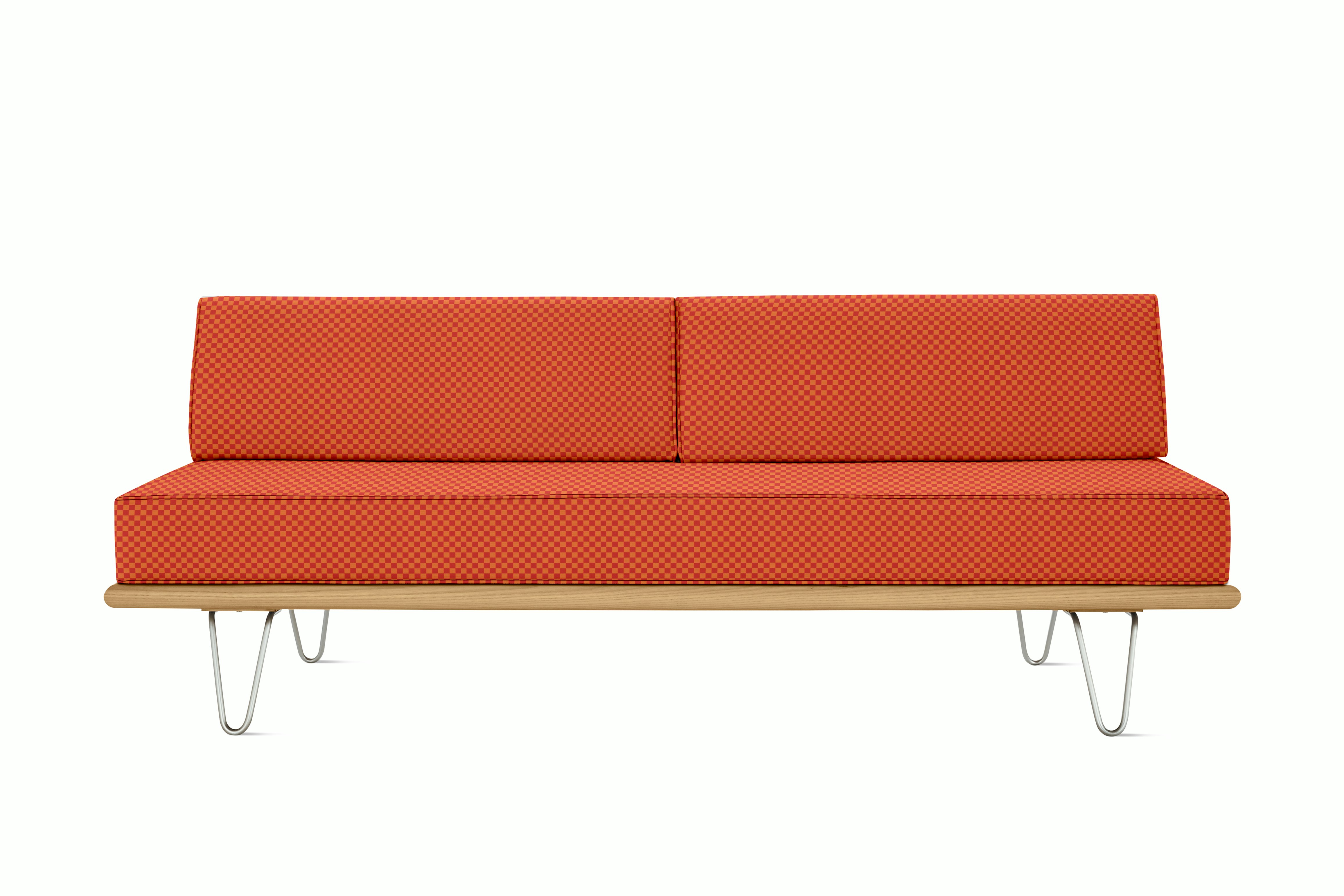 A Nelson Daybed in crimson orange viewed from the front.