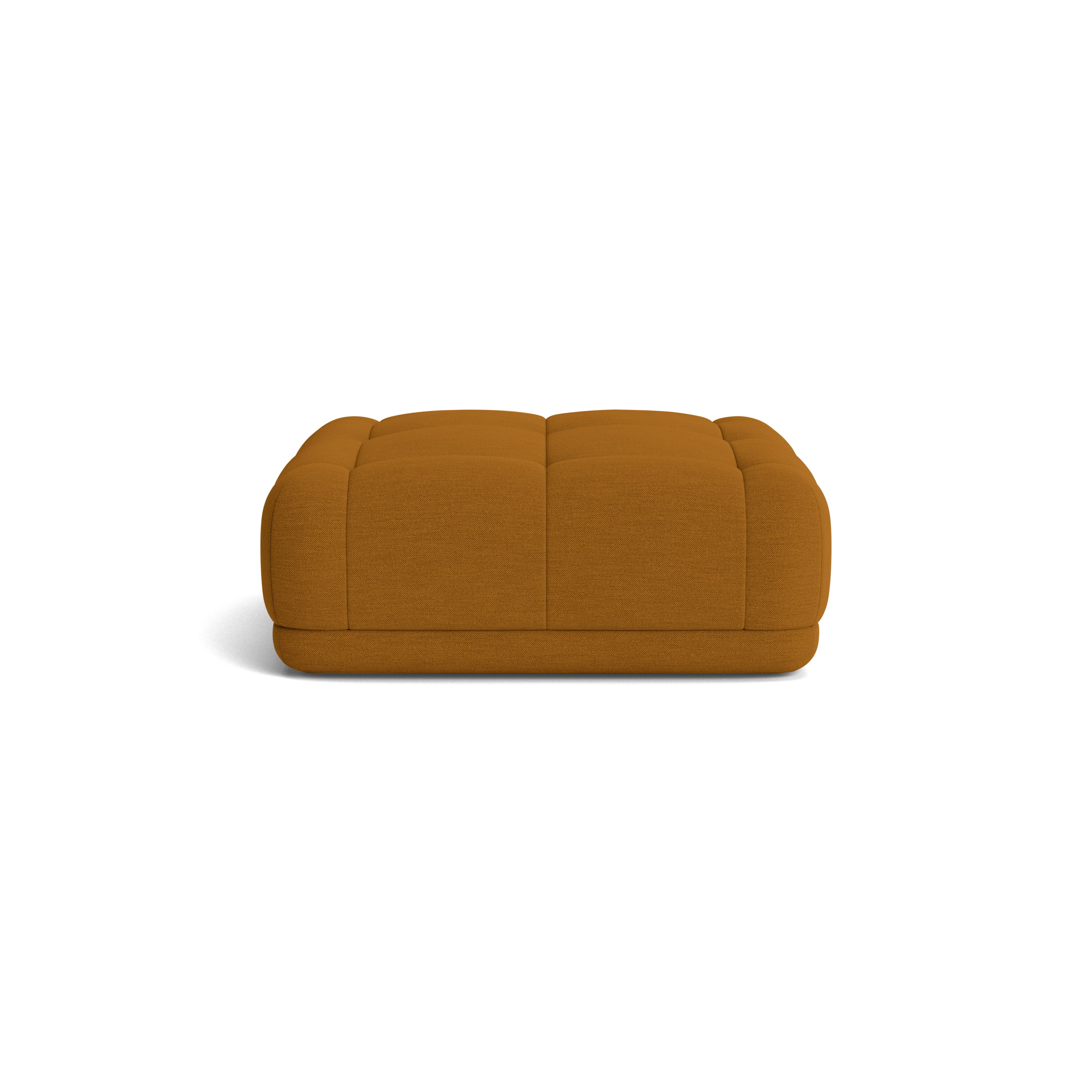 A Quilton Ottoman - Mode, Nutmeg in Nutmeg viewed from the front.
