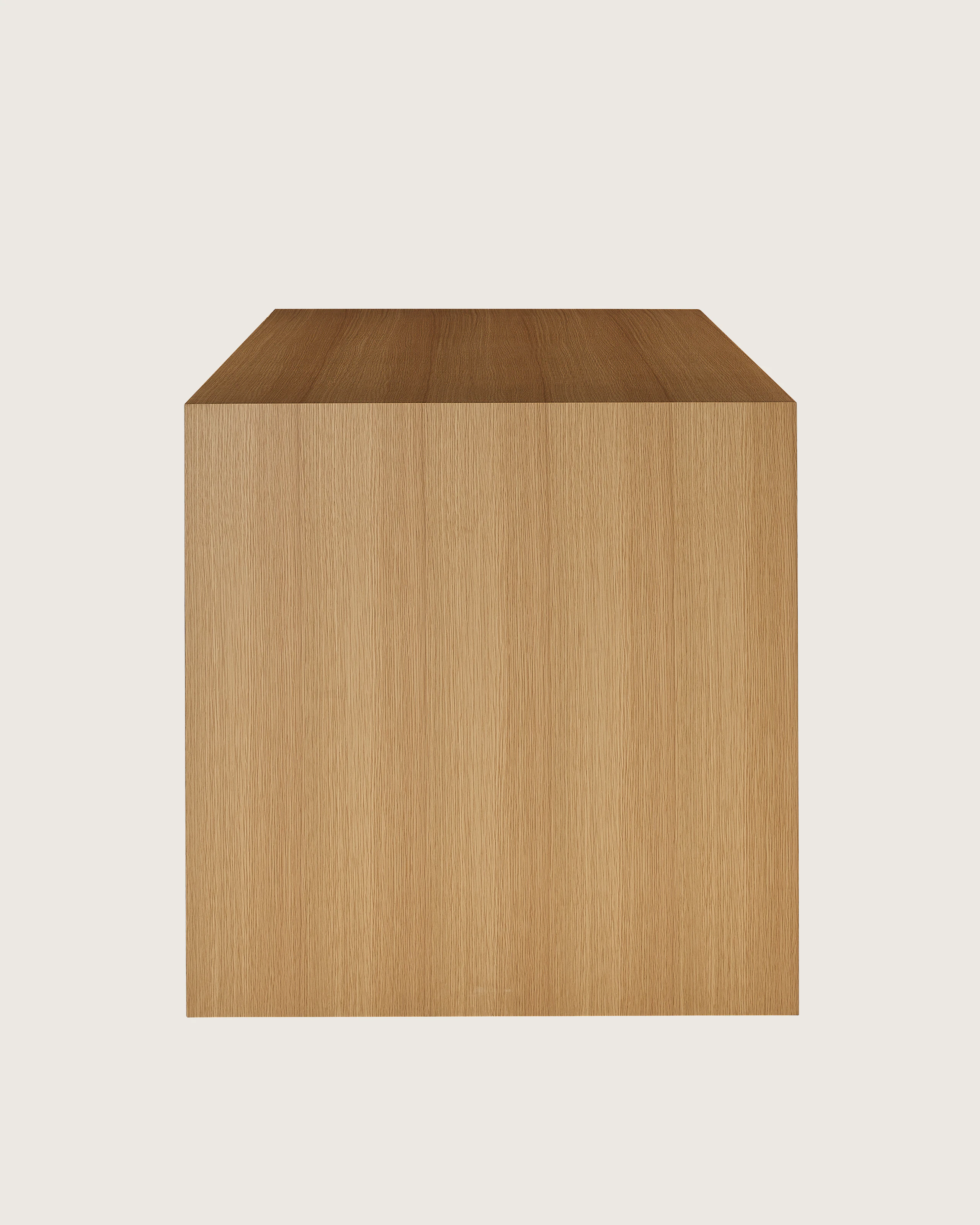 Counter Height JD Waterfall Table in Natural Rift Cut Oak, shown in profile on a white sweep.