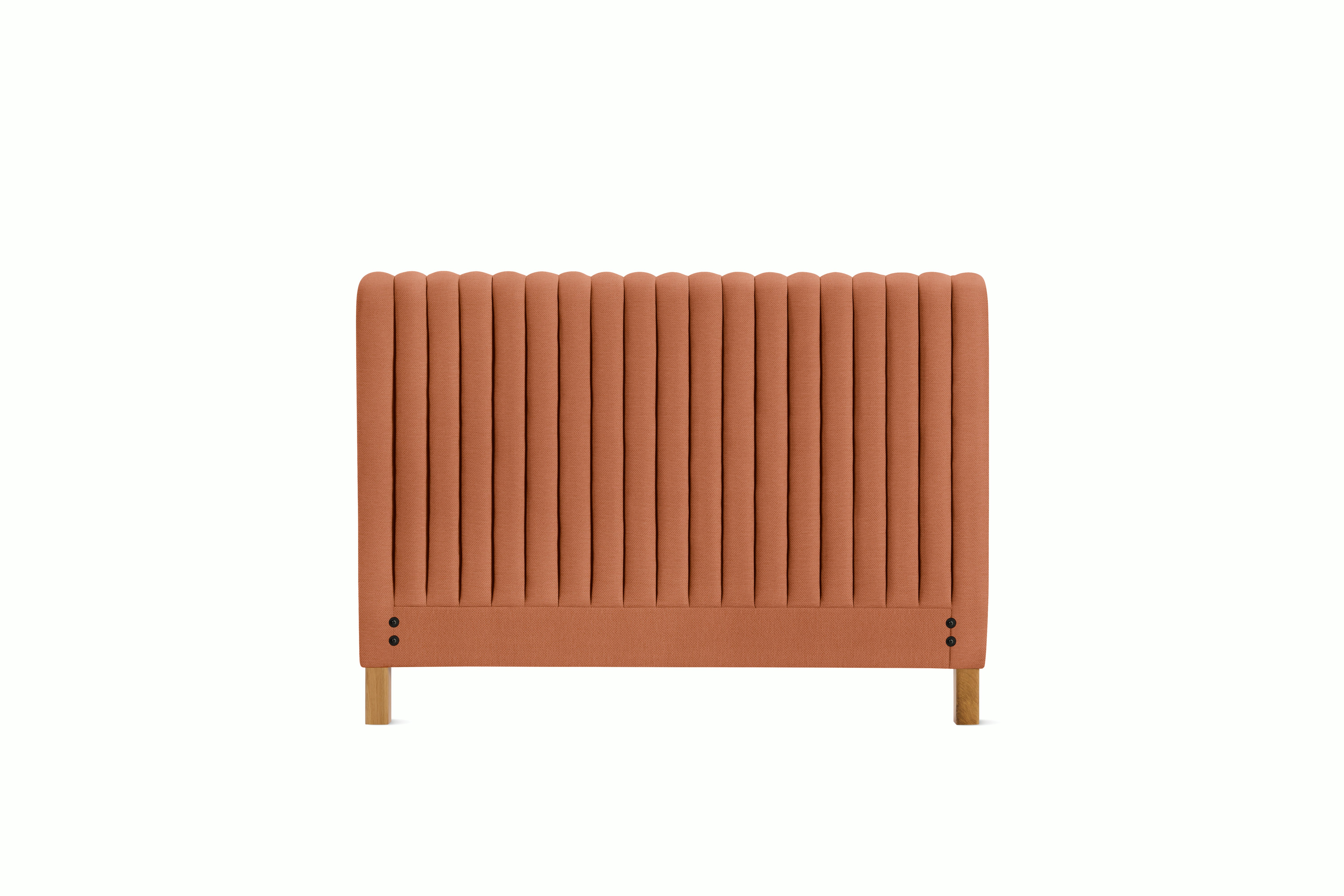 A Charlotte Headboard in Caramelized viewed from an angle.