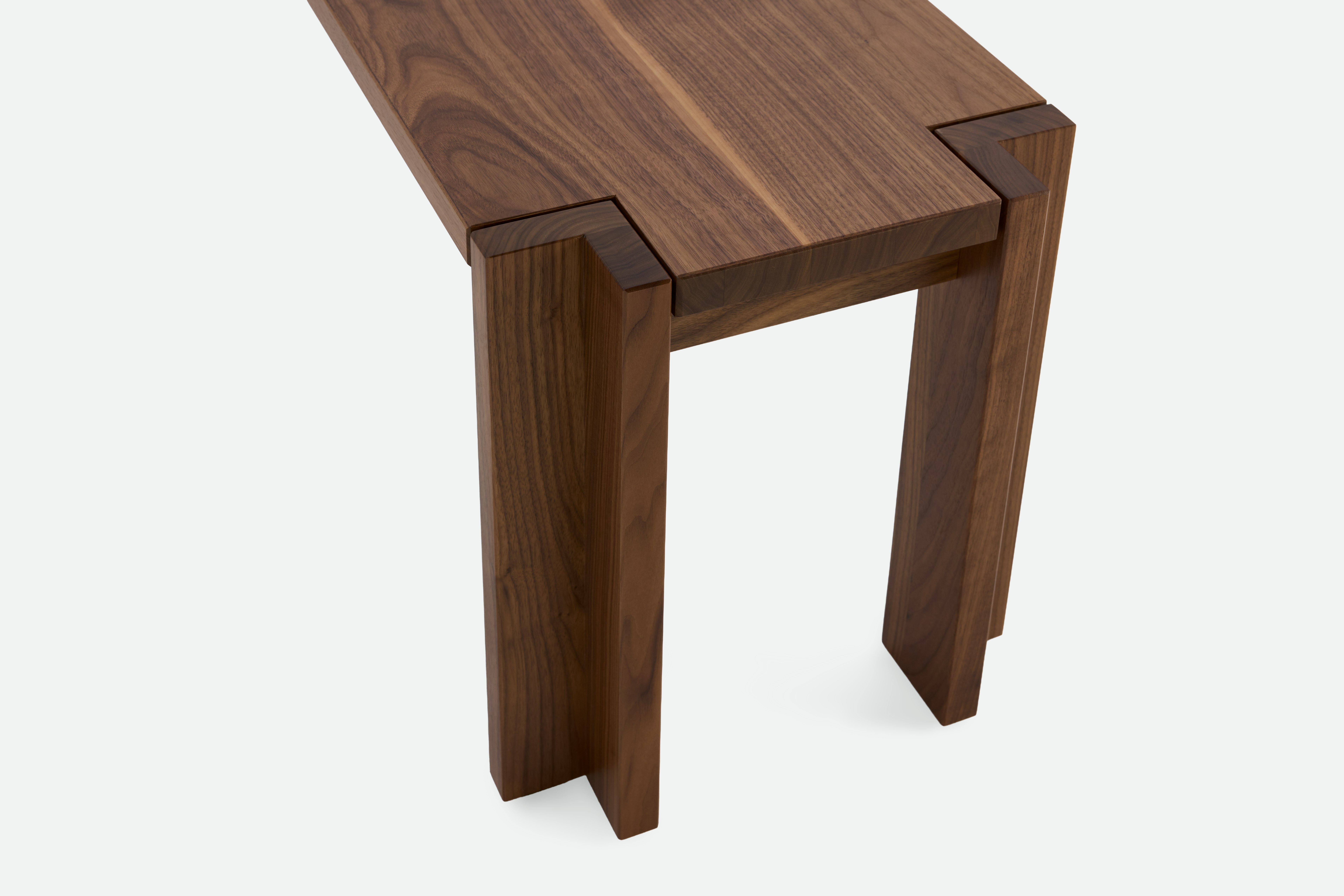 A detailed look at Utzon Dining Bench in Walnut.