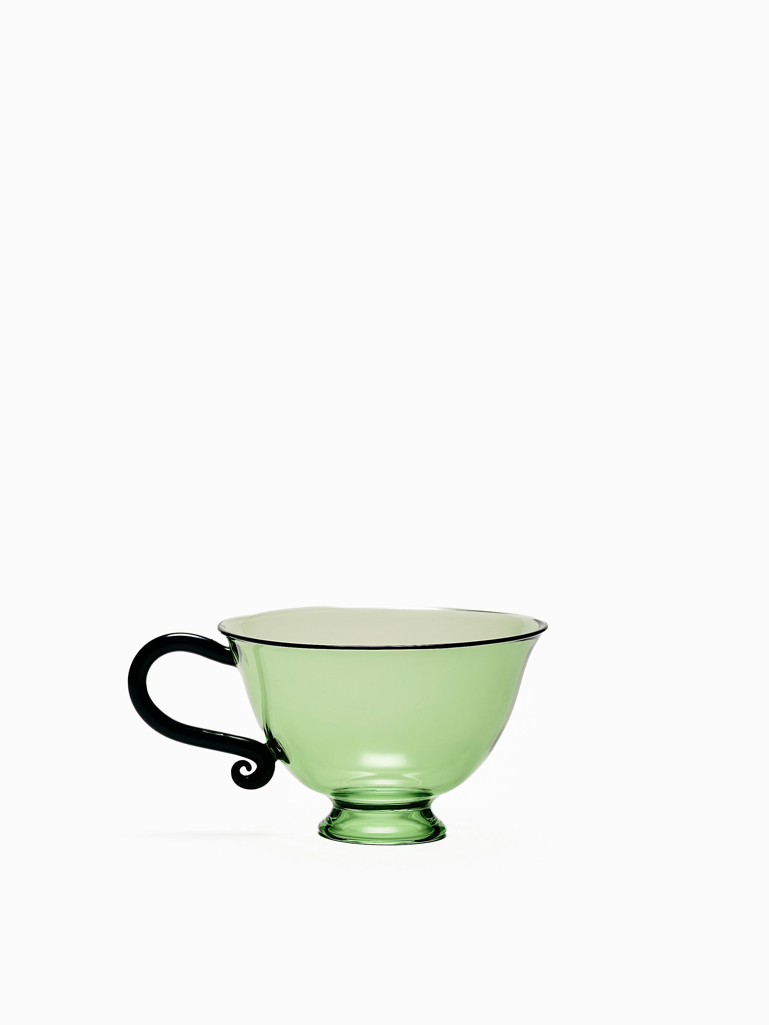A Petite Tasse Cups in Green Black viewed from the front.