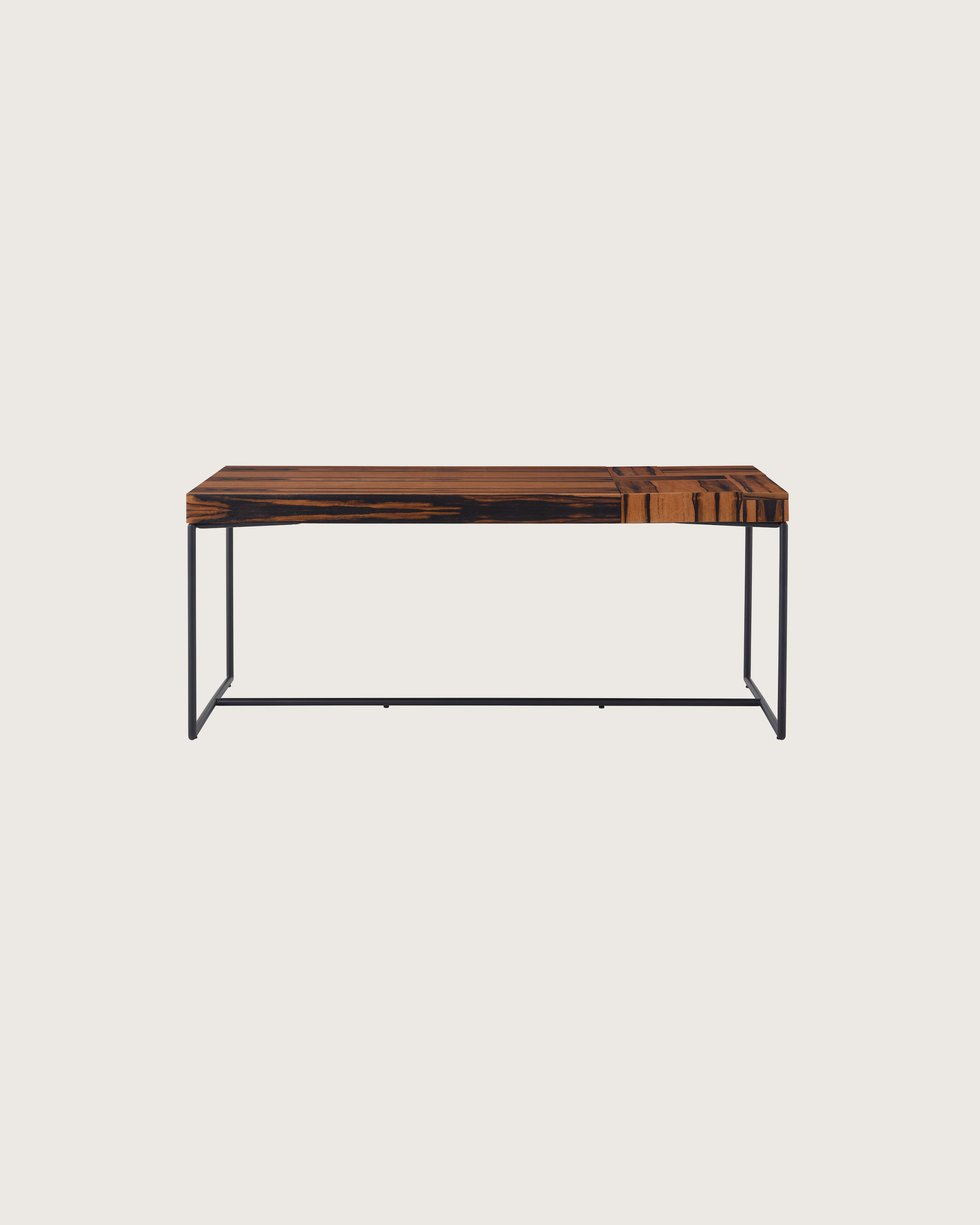 A Domino Desk with wood top and metal base.