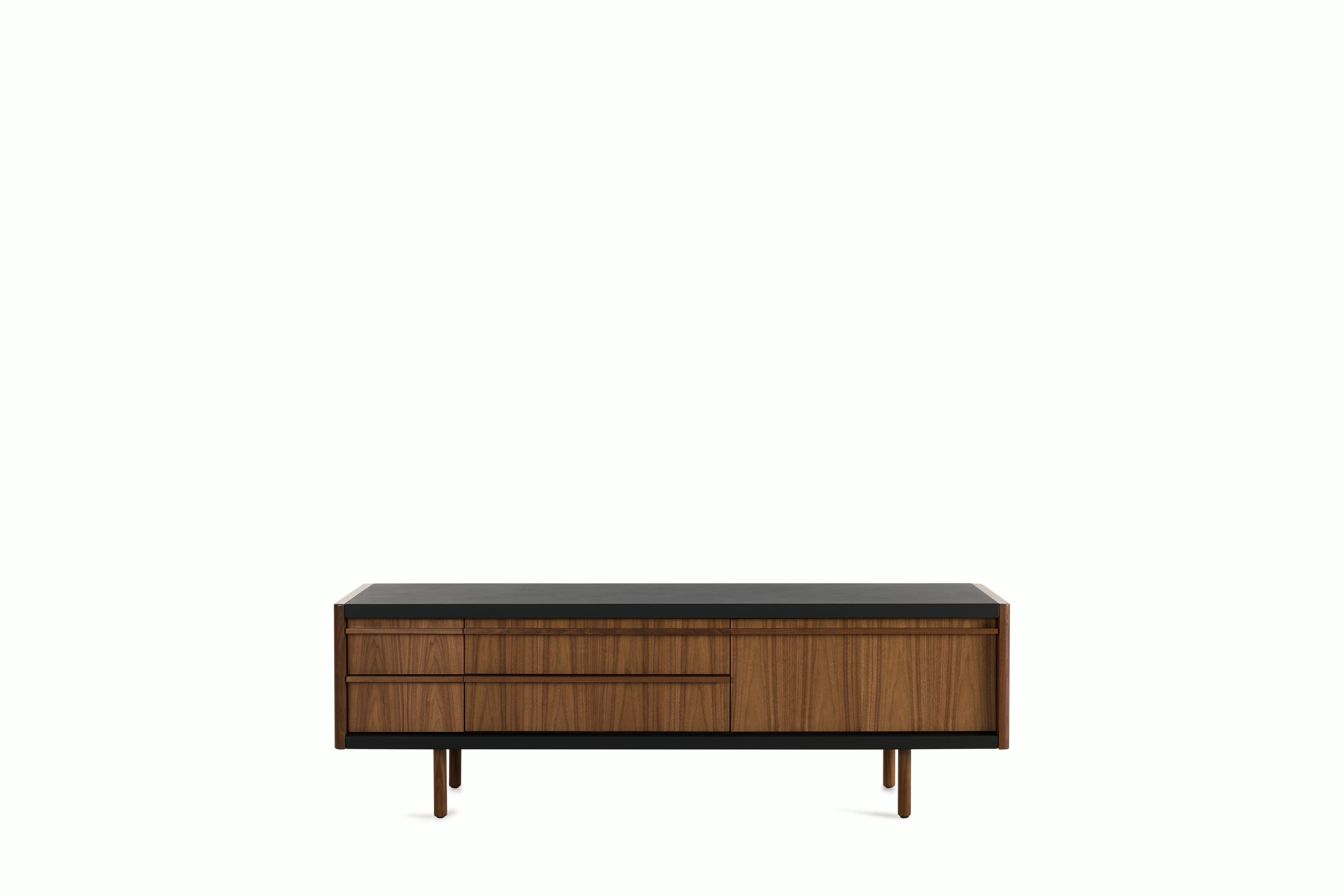 New Canaan Media Unit designed by BassamFellows for Geiger in Walnut with Black Leather shown in front view on a white sweep.