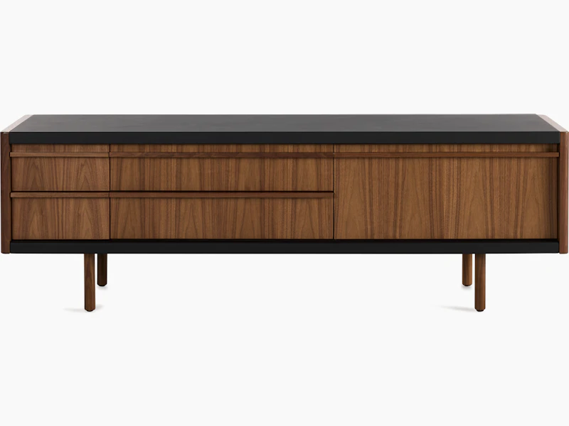 New Canaan Media Unit designed by BassamFellows for Geiger in Walnut with Black Leather shown in front view on a white sweep.