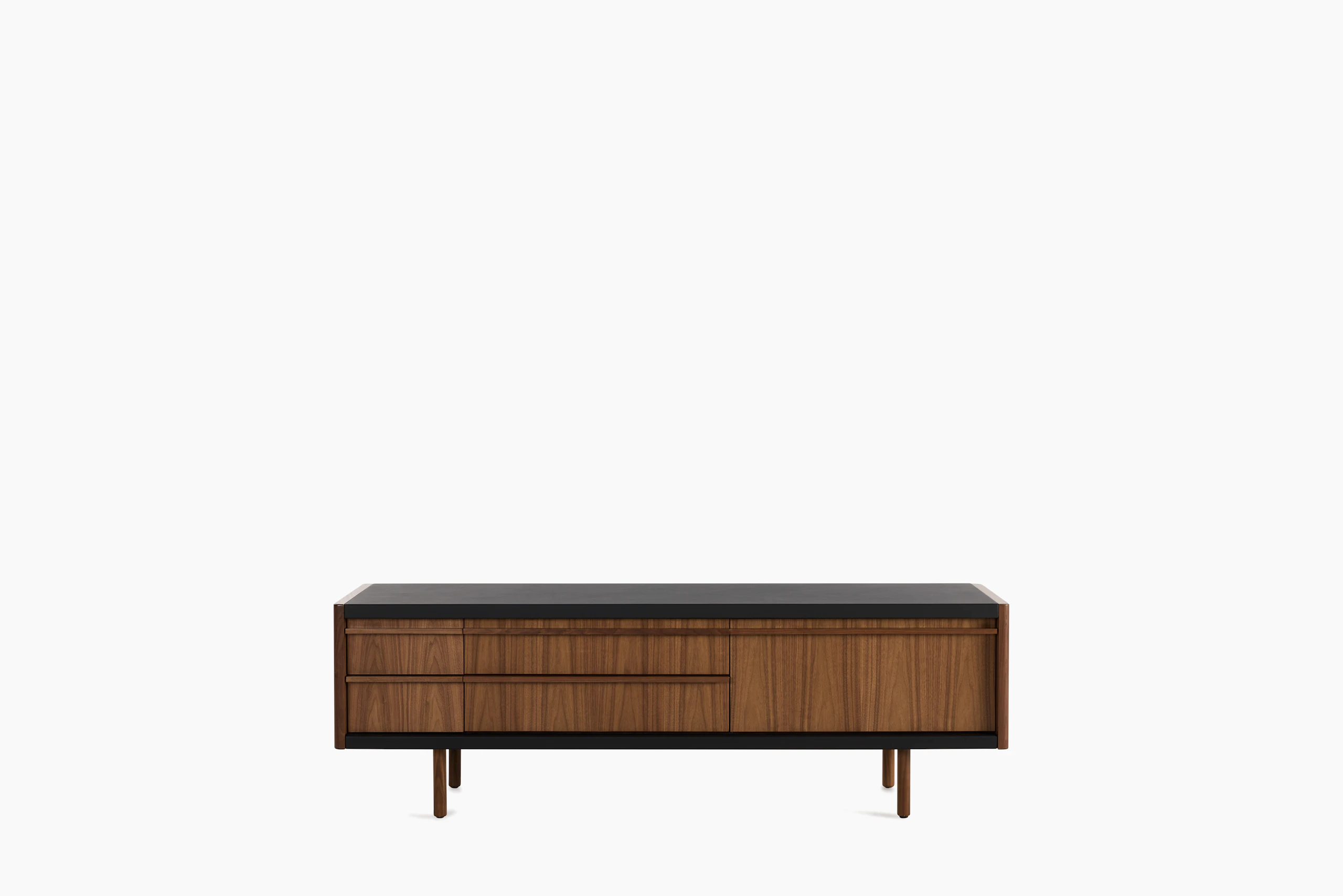 New Canaan Media Unit designed by BassamFellows for Geiger in Walnut with Black Leather shown in front view on a white sweep.