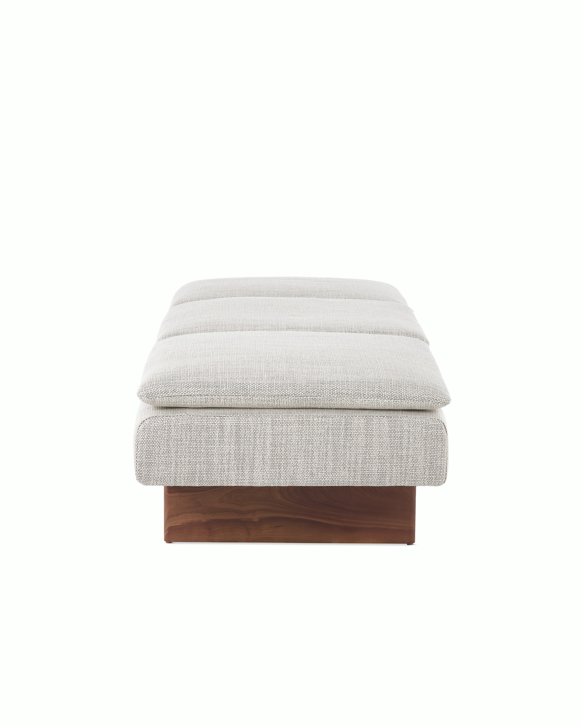 Mantle Bench in Capri Stone with Walnut Wood Base, side view.