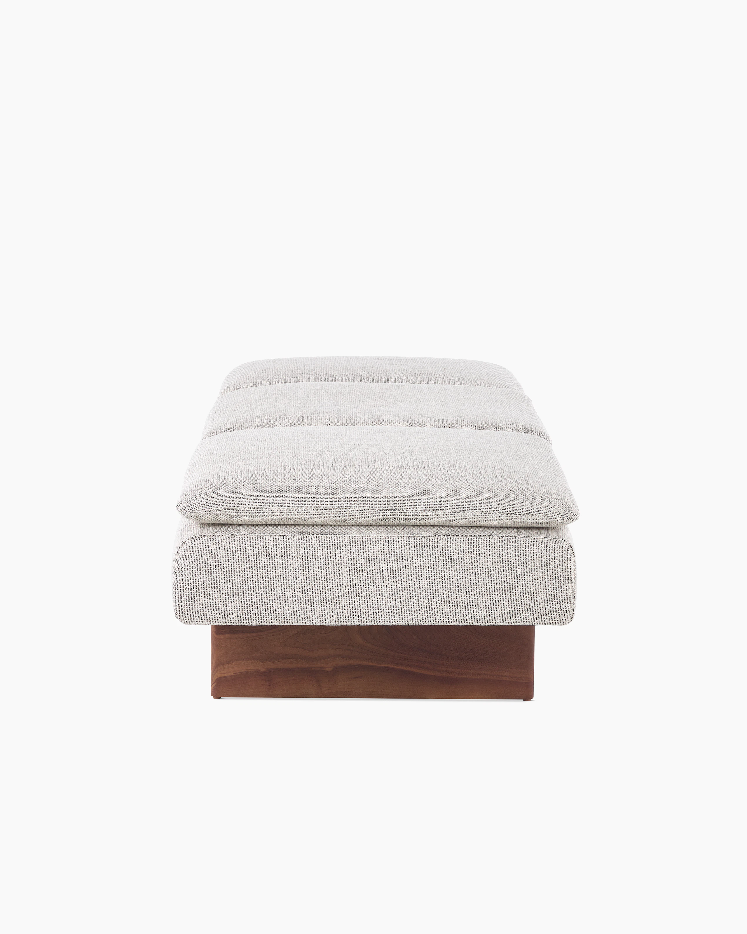 Mantle Bench in Capri Stone with Walnut Wood Base, side view.