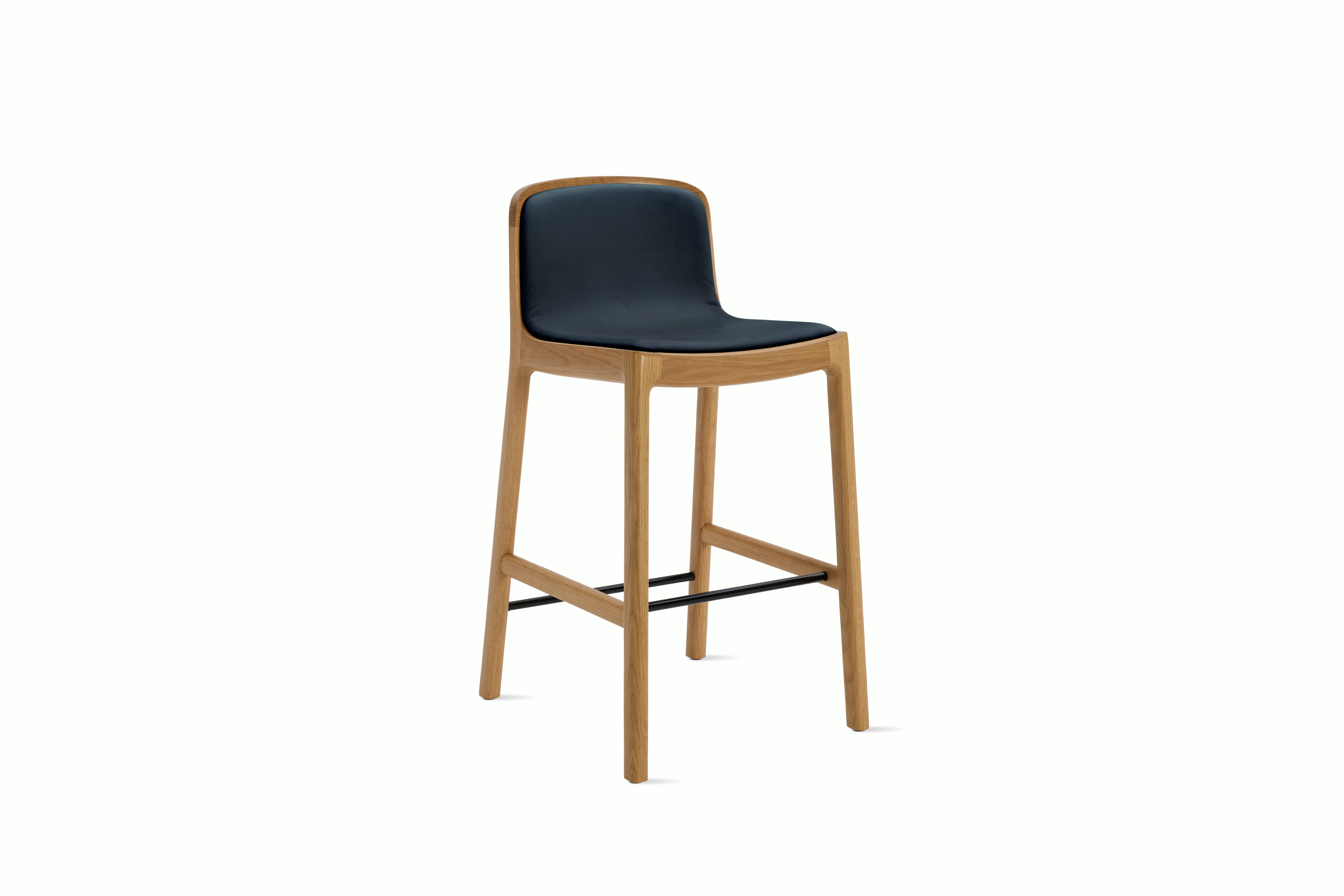A Lijn Stool in Sail Oak viewed from an angle.