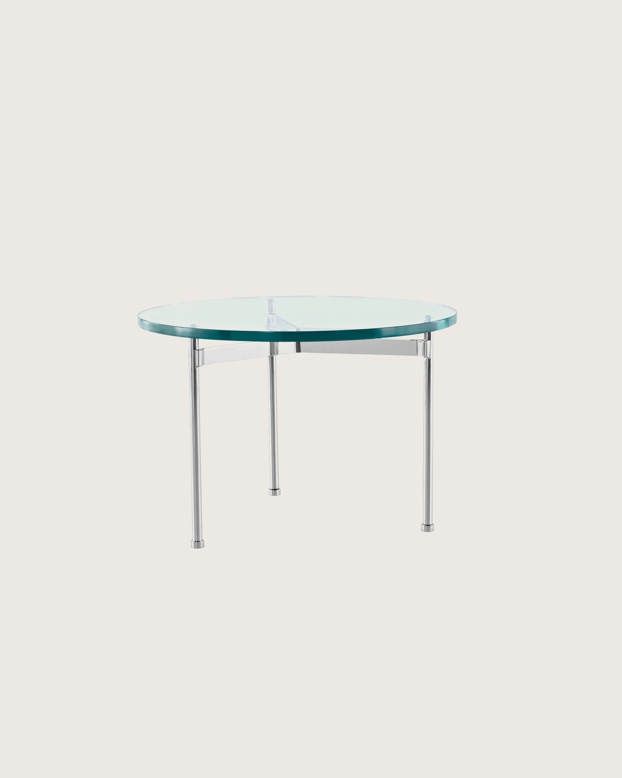 A round Claw occasional table with a glass top, metal cross brace, and three legs.