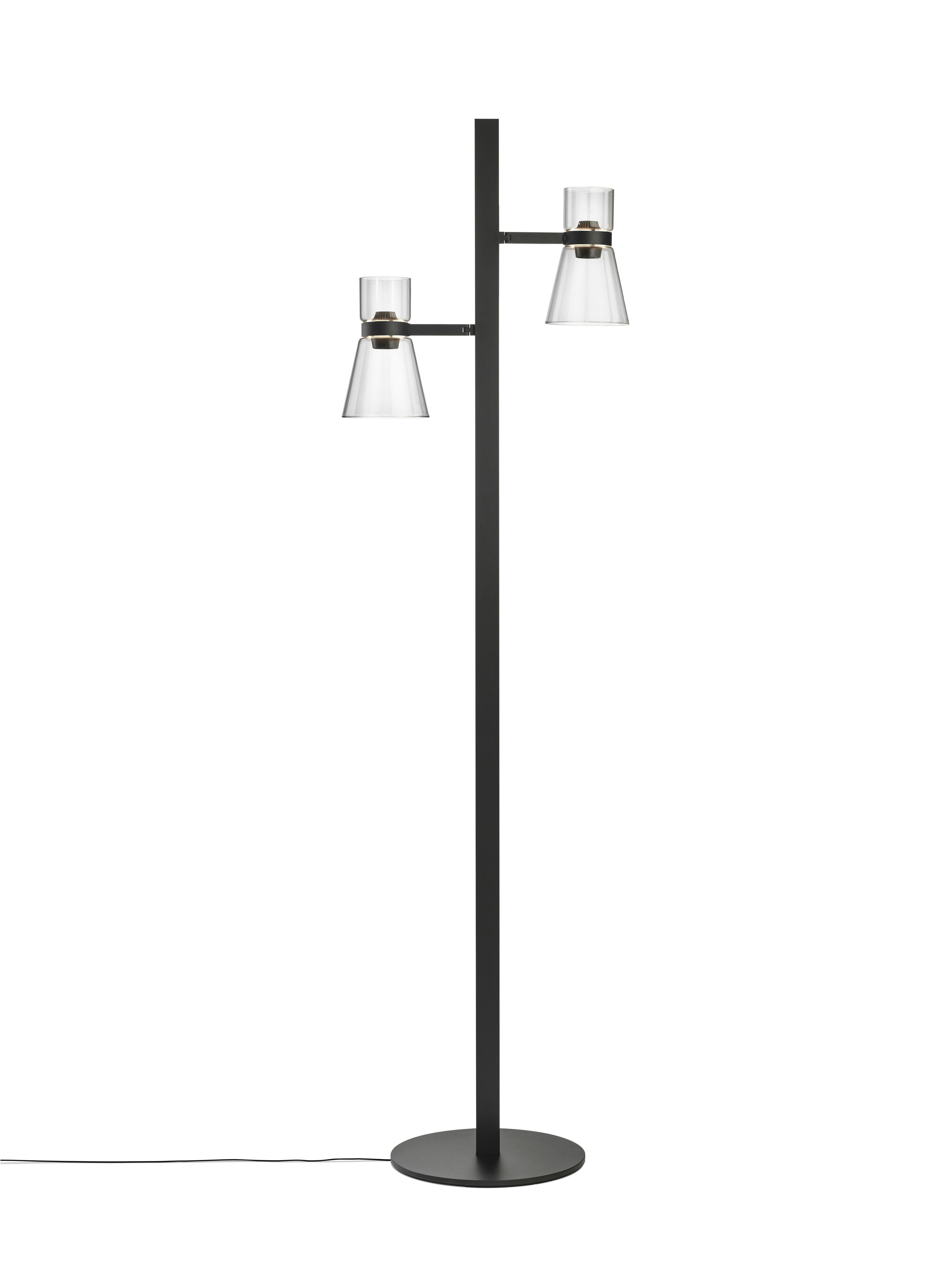 A Nocturne Floor Lamp in F2 Cone, Black viewed from behind.