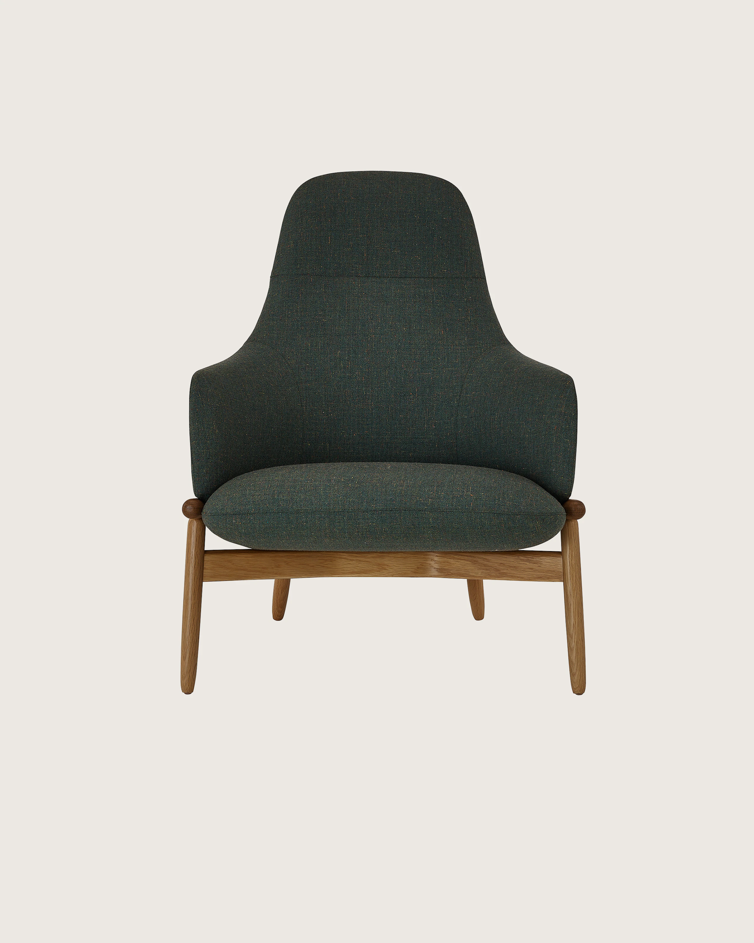 High Back Reframe Lounge Chair designed by EOOS upholstered in Rowan in Zucchini with a Natural Oak base, shown front-facing on a white sweep.